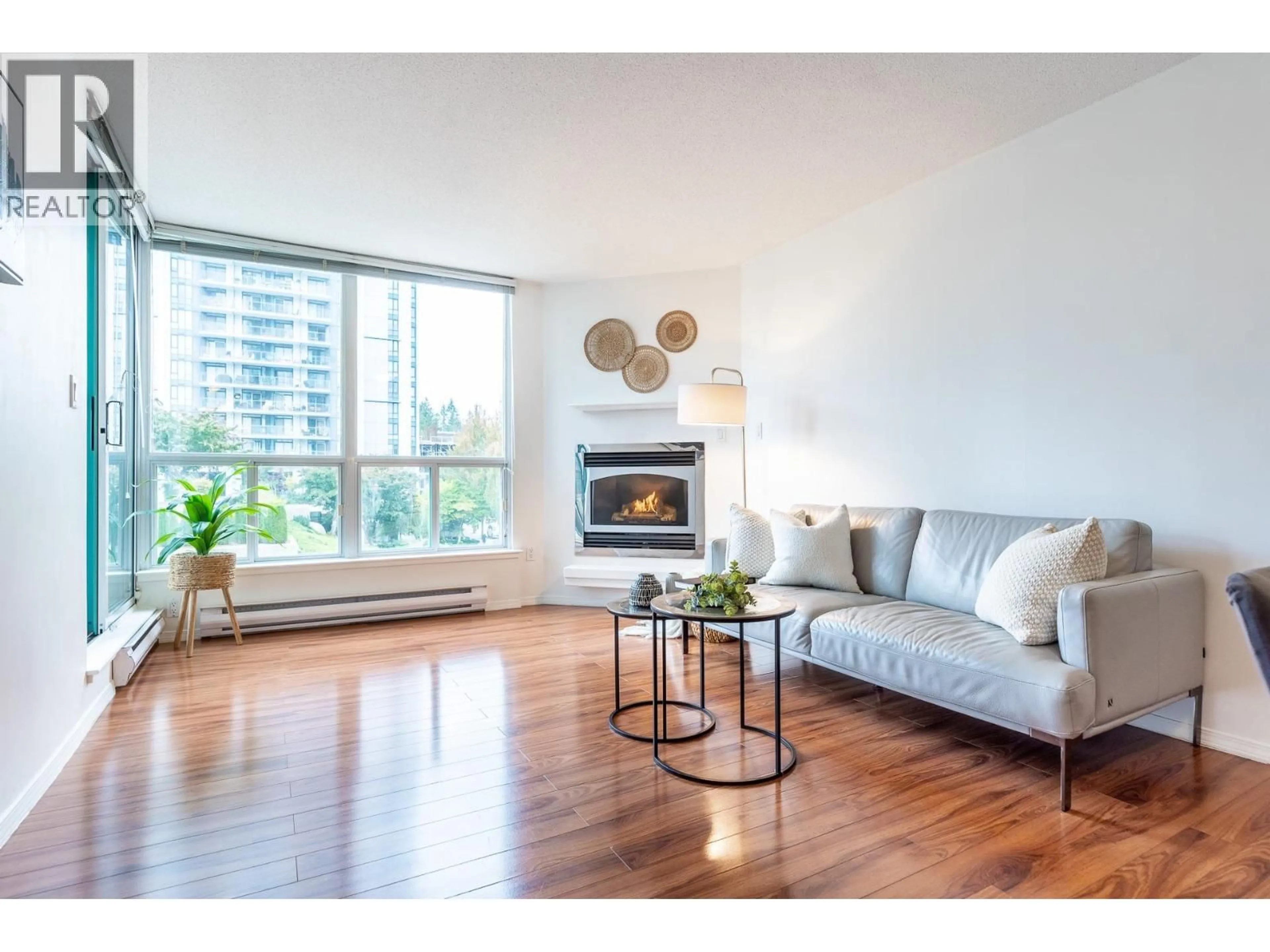 Living room with furniture, wood/laminate floor for 405 - 1148 HEFFLEY CRESCENT, Coquitlam British Columbia V3B8A6