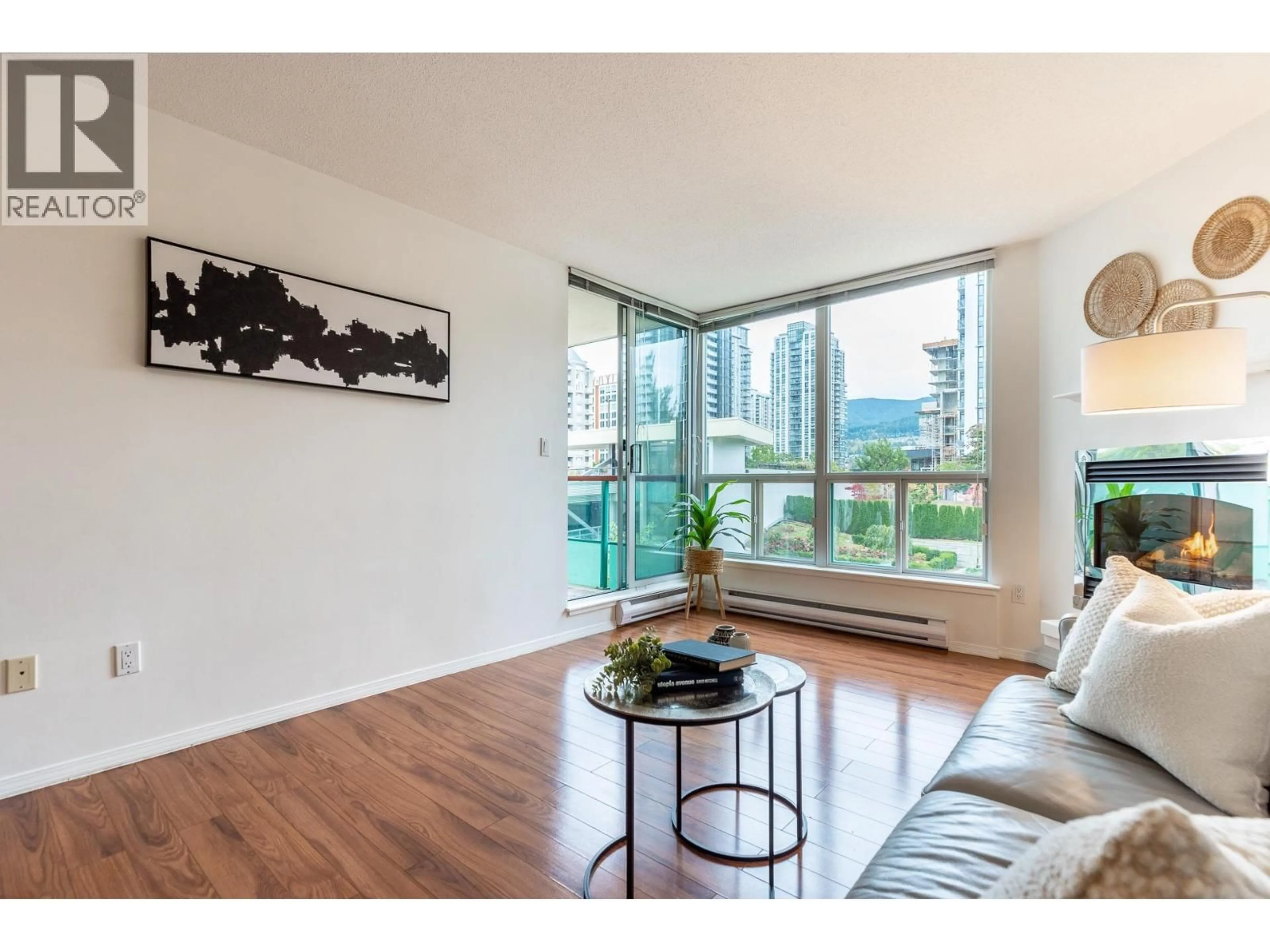 Living room with furniture, wood/laminate floor for 405 - 1148 HEFFLEY CRESCENT, Coquitlam British Columbia V3B8A6