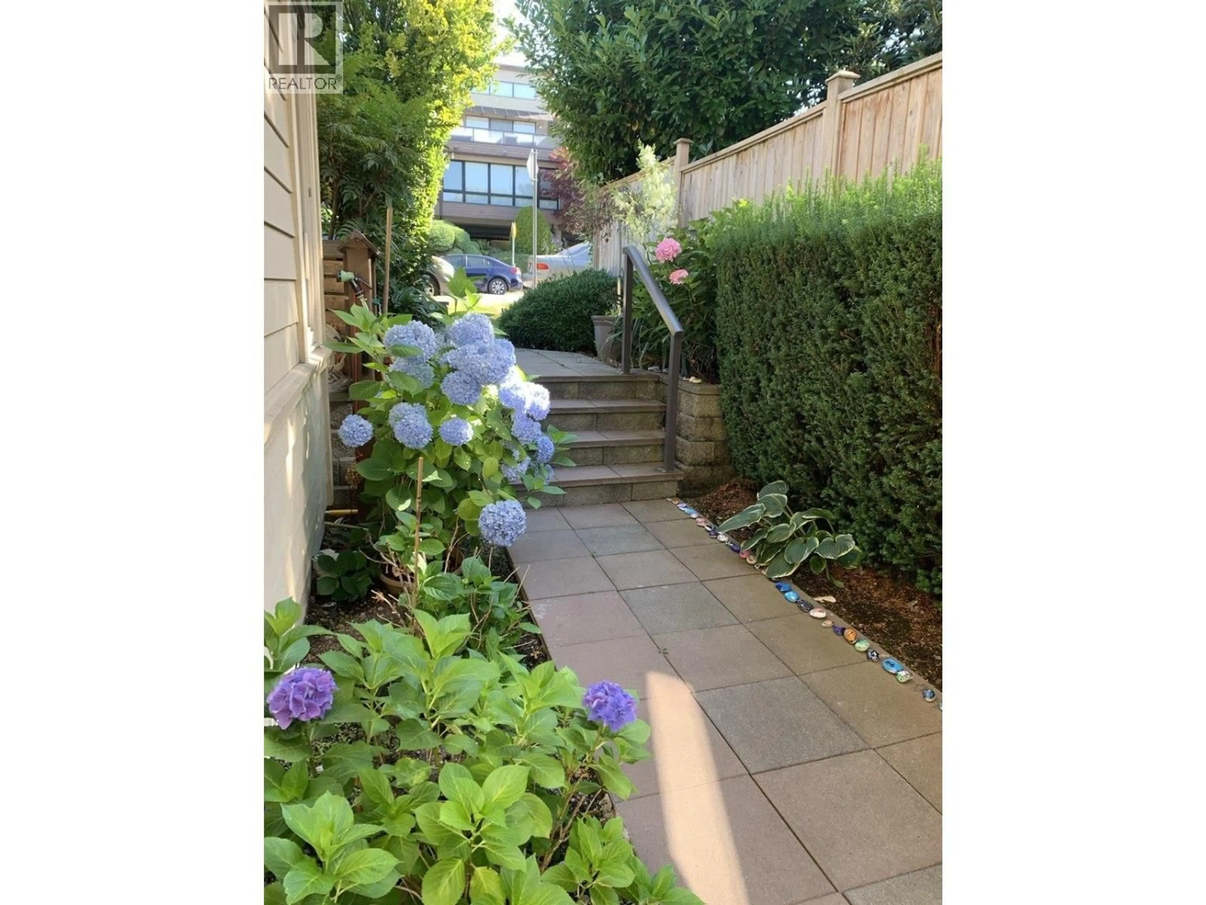 A pic from outside/outdoor area/front of a property/back of a property/a pic from drone, street for 9 - 215 4TH STREET, North Vancouver British Columbia V7L1J1