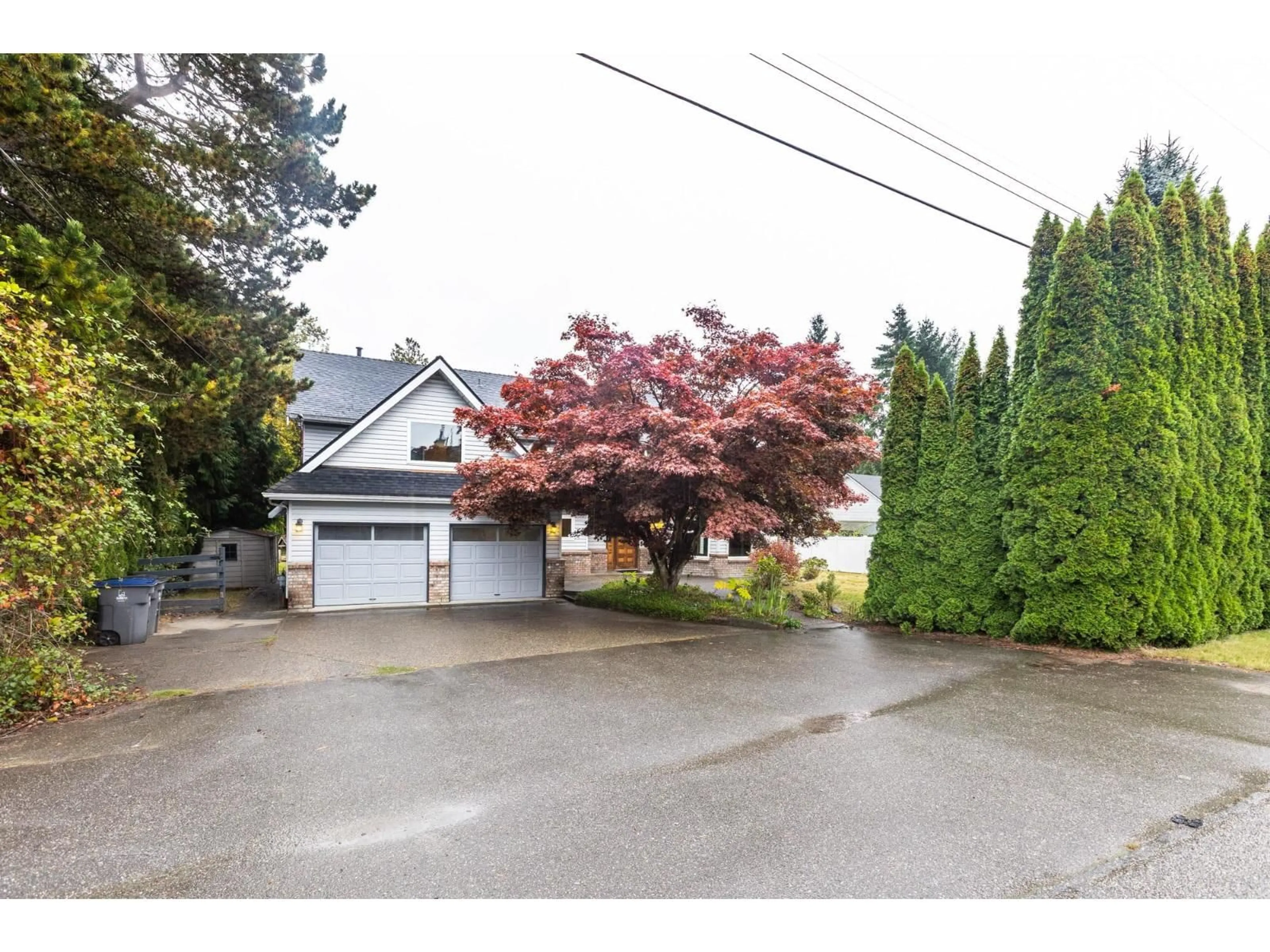 A pic from outside/outdoor area/front of a property/back of a property/a pic from drone, street for 8072 170A, Surrey British Columbia V4N3G4