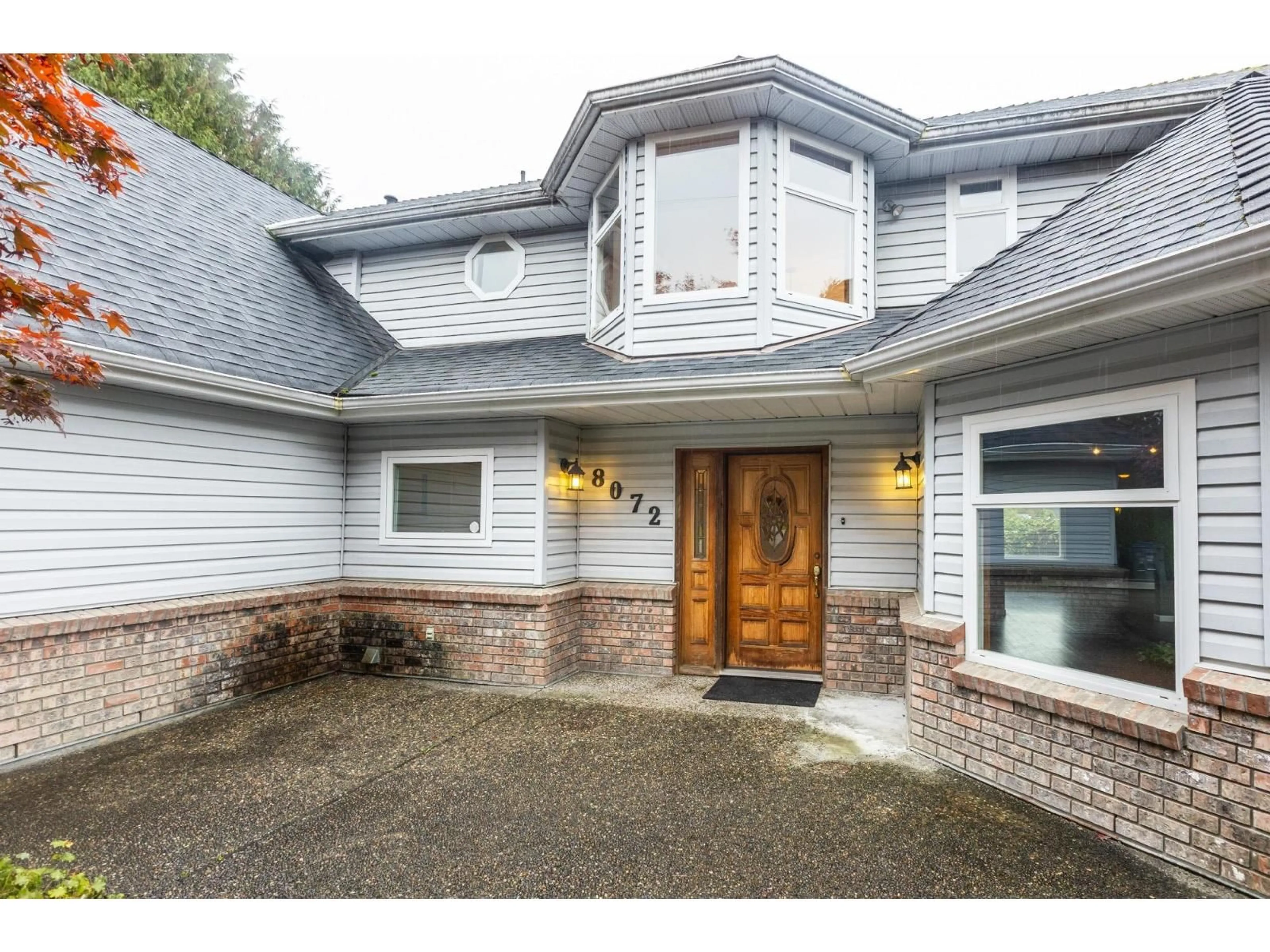 Home with brick exterior material, street for 8072 170A, Surrey British Columbia V4N3G4