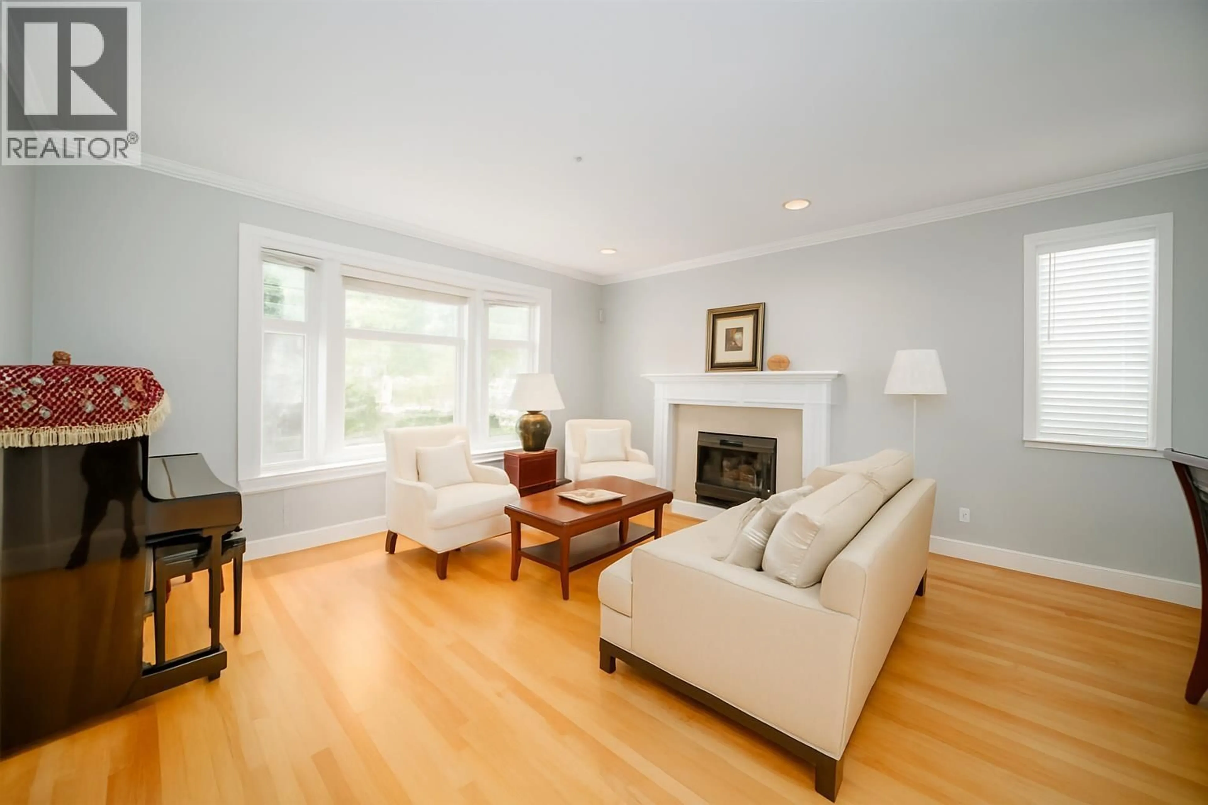 Living room with furniture, wood/laminate floor for 2726 42ND AVENUE, Vancouver British Columbia V6N3G5