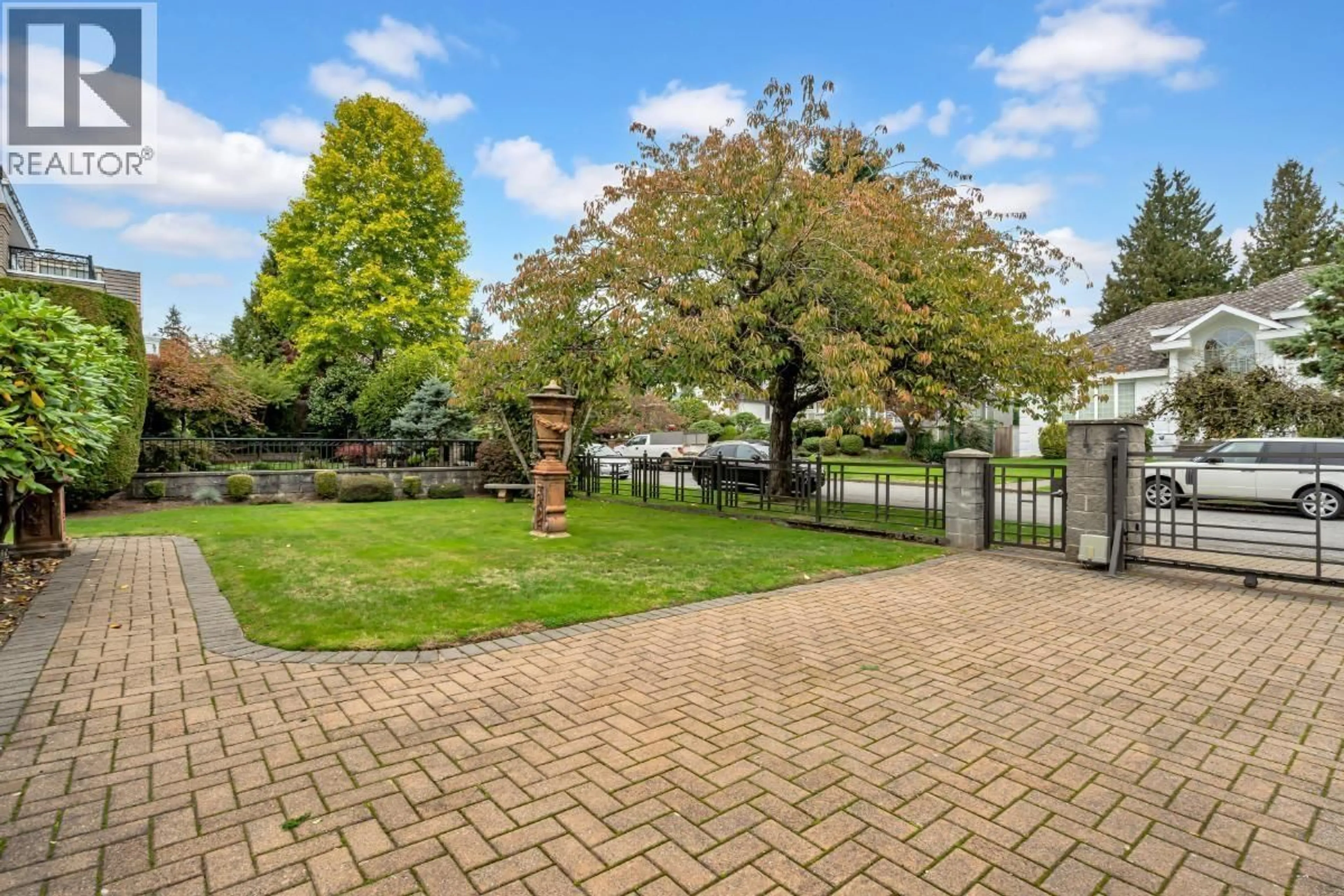 A pic from outside/outdoor area/front of a property/back of a property/a pic from drone, street for 7187 MARGUERITE STREET, Vancouver British Columbia V6P5G4