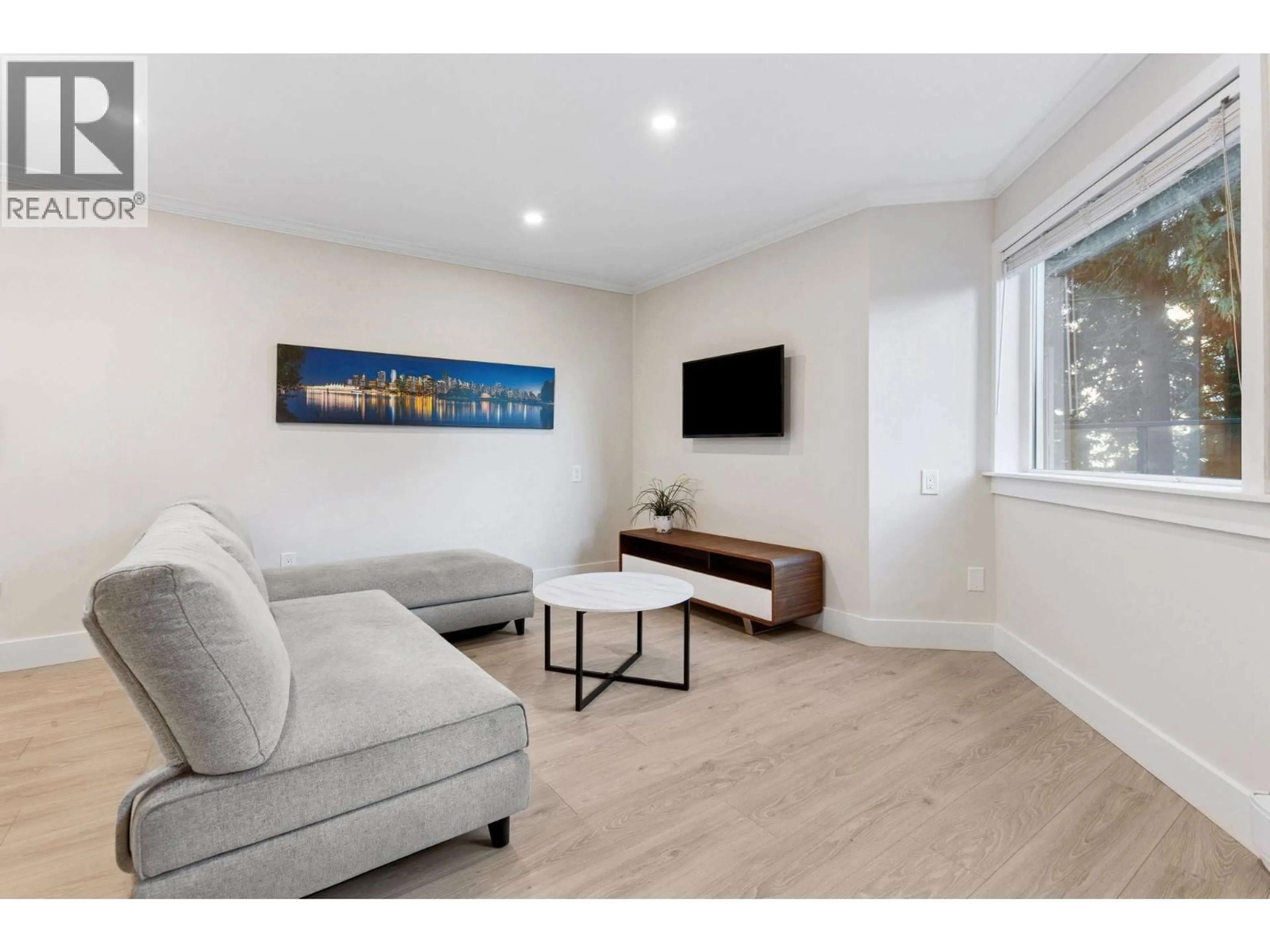 Living room with furniture, wood/laminate floor for 104 - 1365 4TH AVENUE, Vancouver British Columbia V6H3Y8