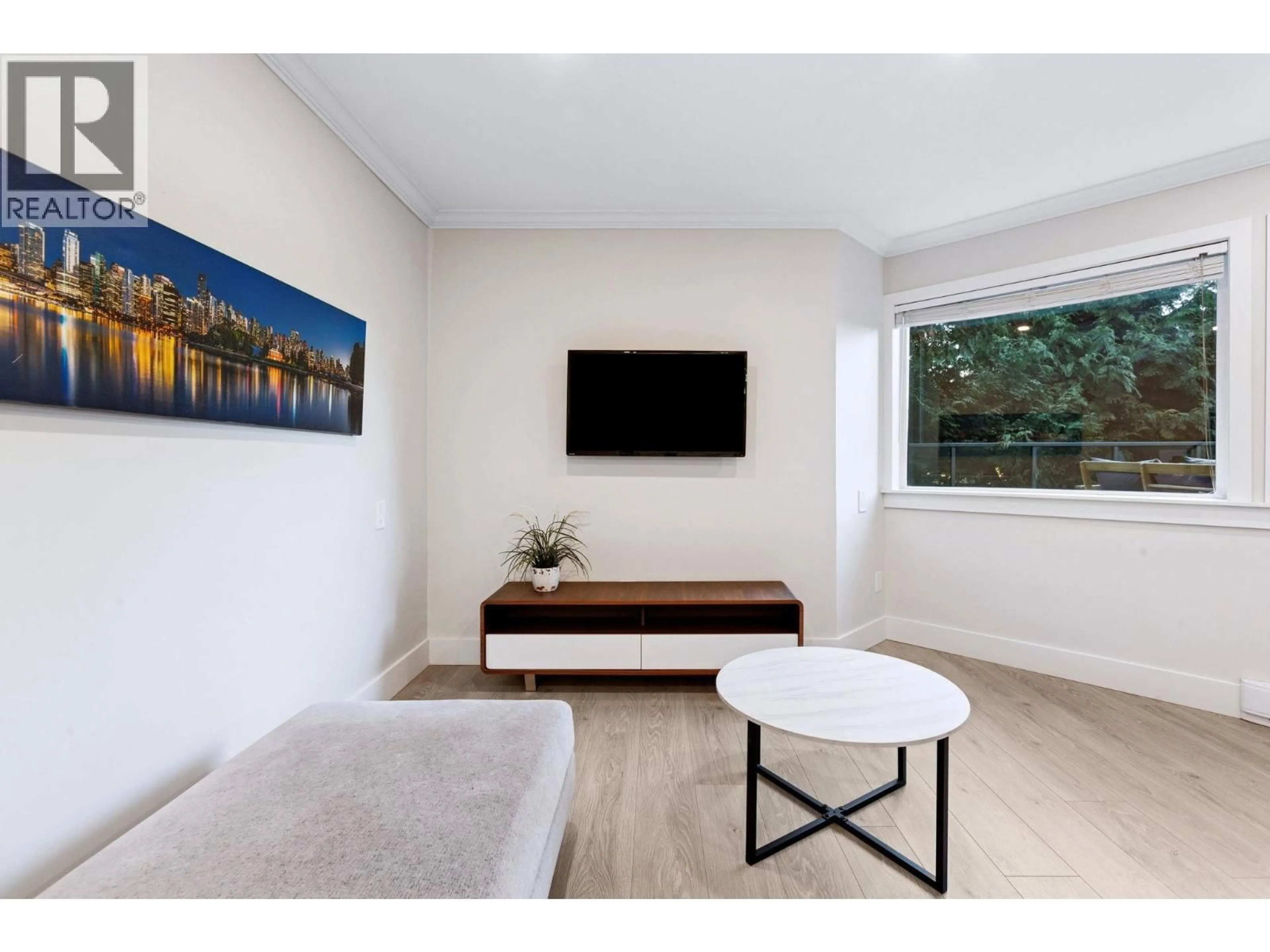 Living room with furniture, wood/laminate floor for 104 - 1365 4TH AVENUE, Vancouver British Columbia V6H3Y8