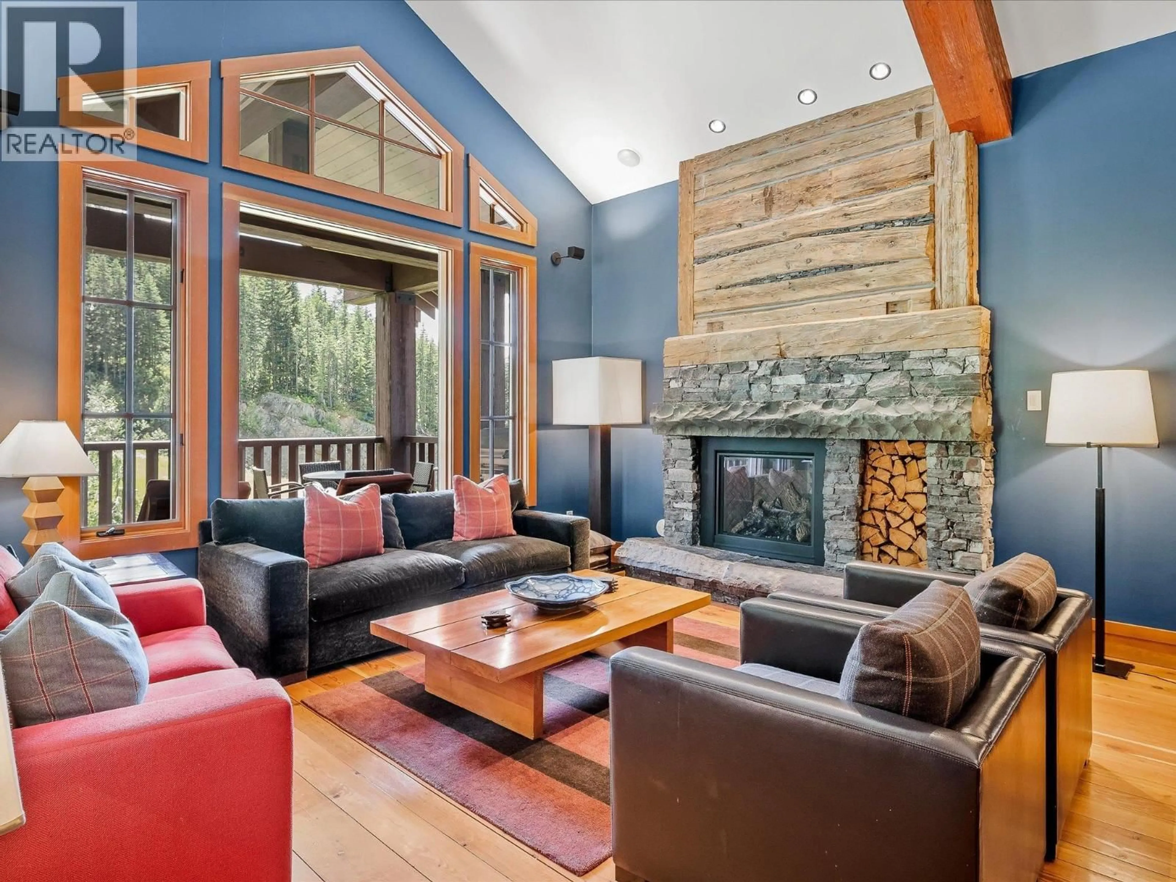 Living room with furniture, wood/laminate floor for 10B - 2300 NORDIC DRIVE, Whistler British Columbia V8E0A6