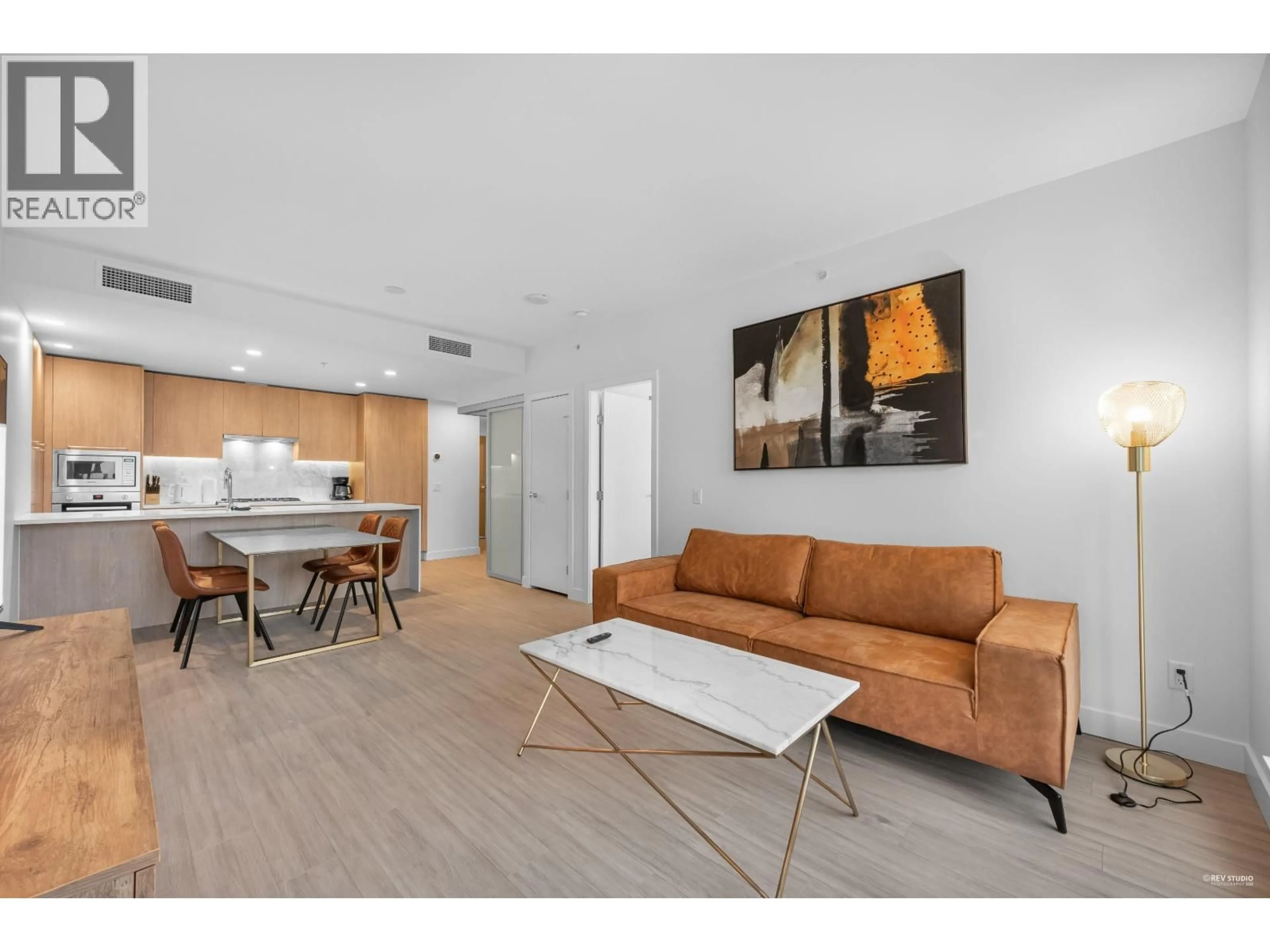 Living room with furniture, wood/laminate floor for 703 - 6398 SILVER AVENUE, Burnaby British Columbia V5H0K7