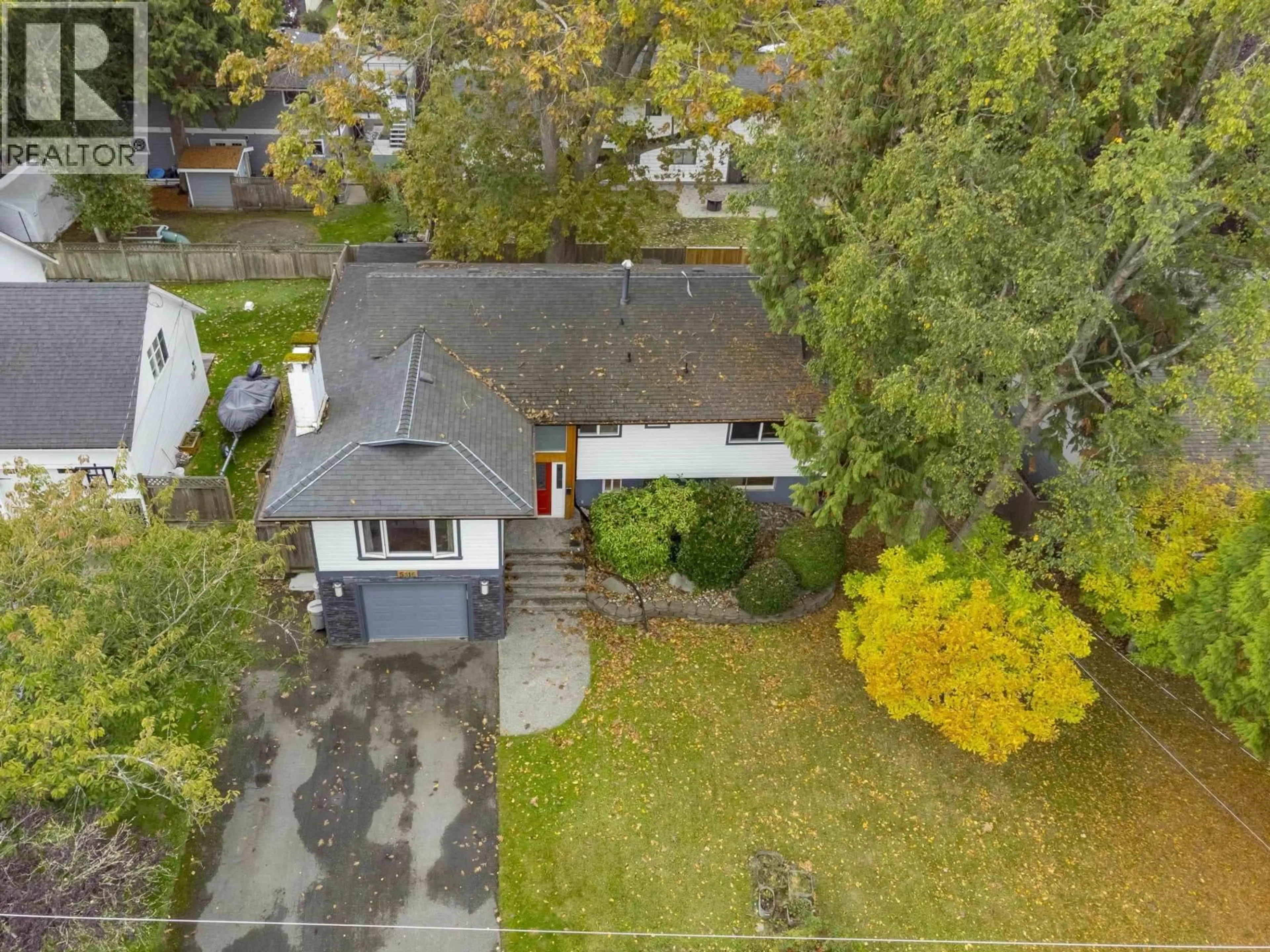 A pic from outside/outdoor area/front of a property/back of a property/a pic from drone, street for 5316 BELAIR DRIVE, Tsawwassen British Columbia V4M2E4