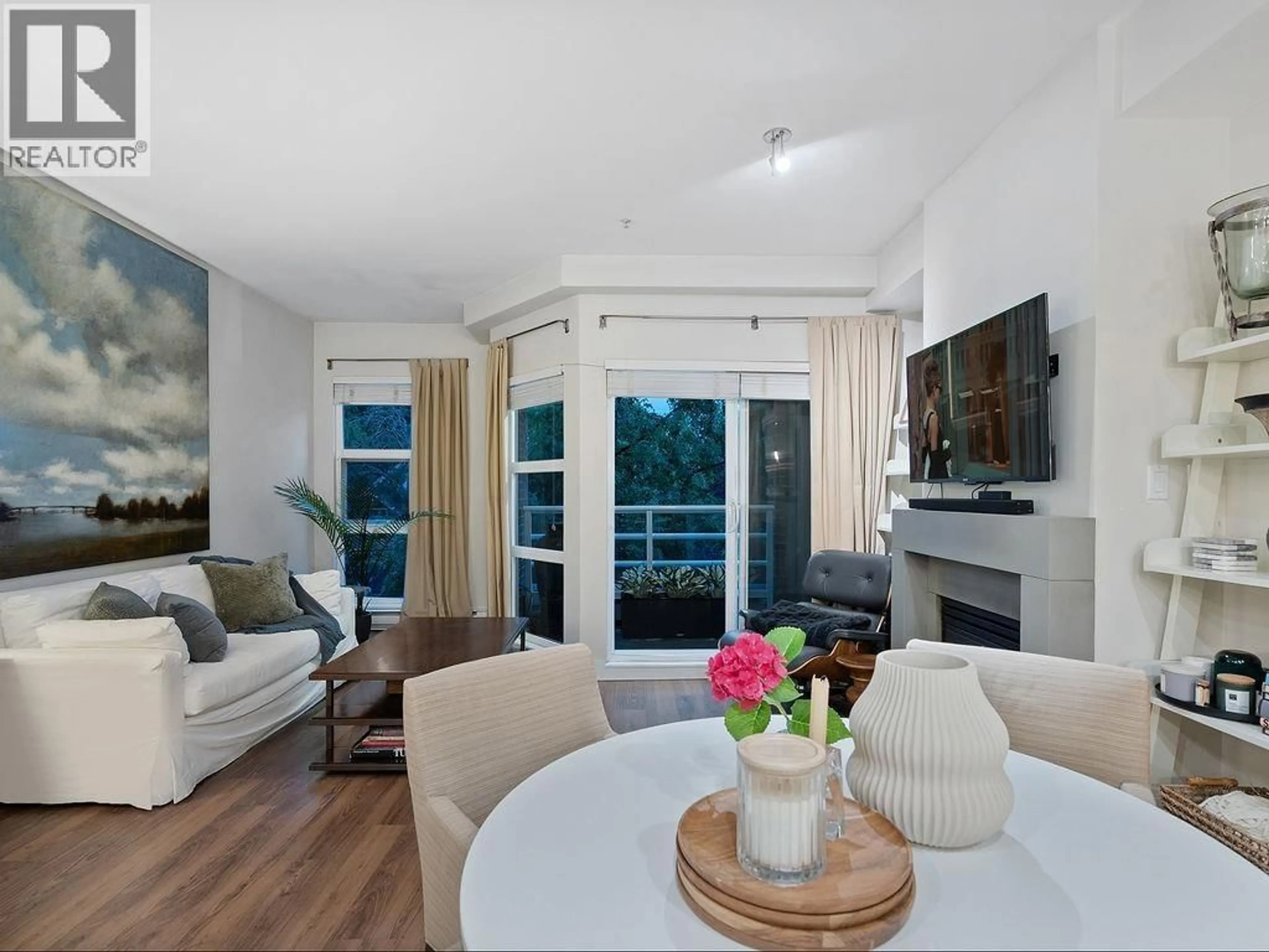 Living room with furniture, wood/laminate floor for 361 - 5790 EAST BOULEVARD, Vancouver British Columbia V6M4M4