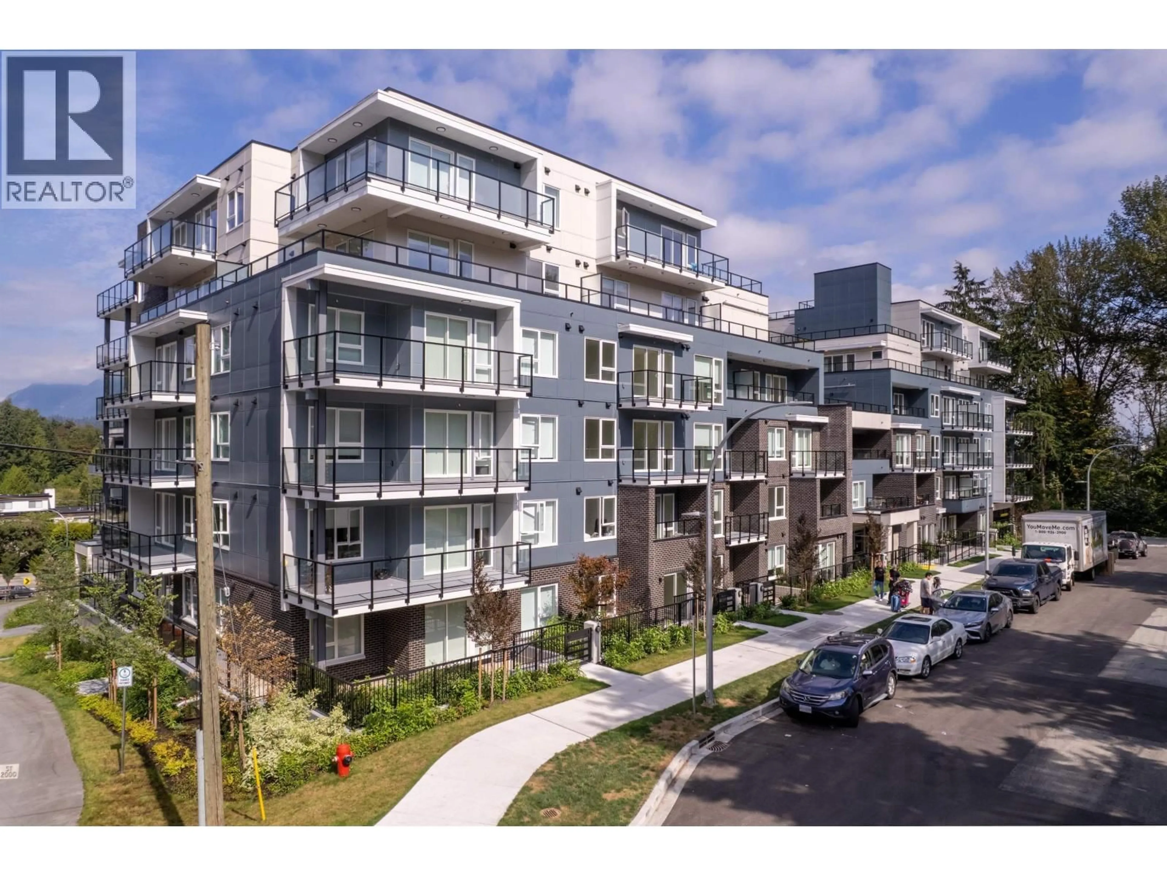 A pic from outside/outdoor area/front of a property/back of a property/a pic from drone, street for 506 - 2002 ST. GEORGE STREET, Port Moody British Columbia V3H0N4