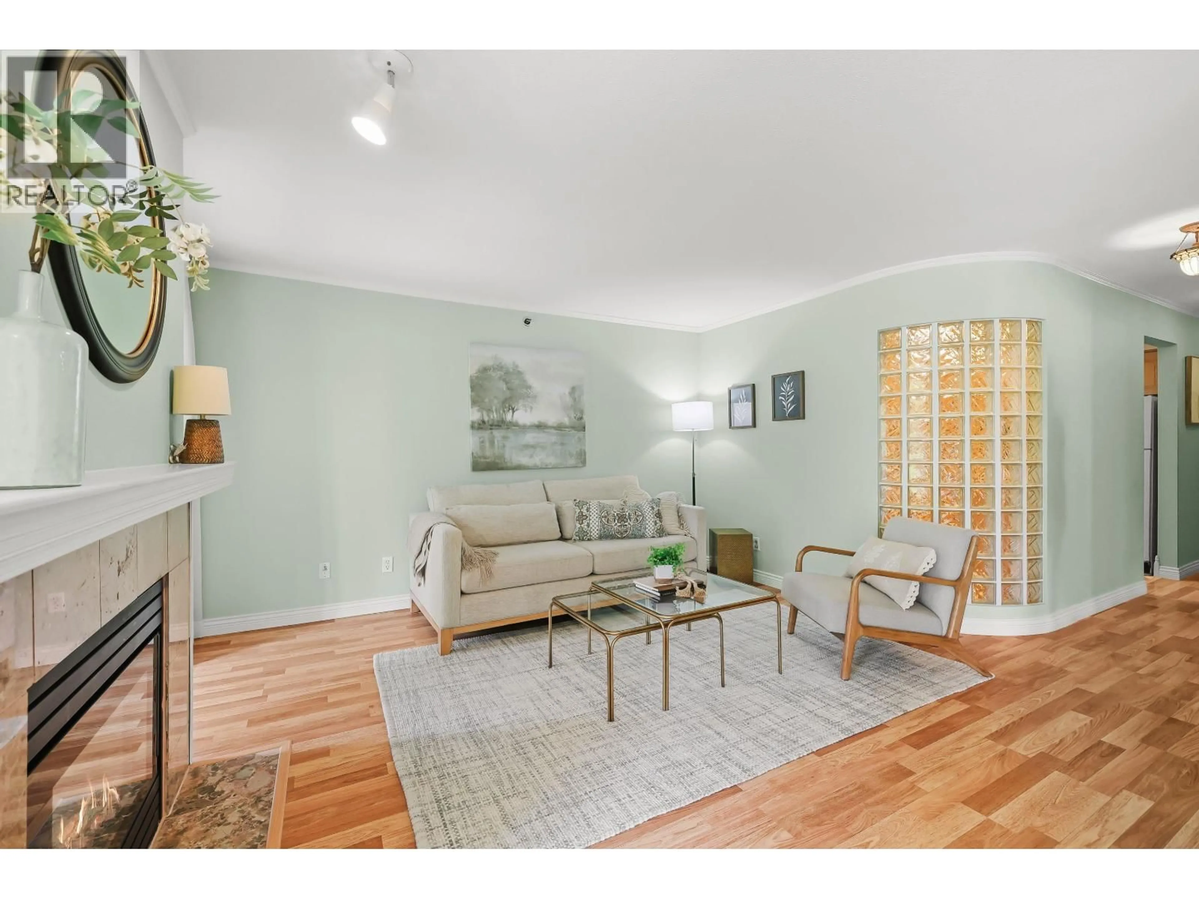 Living room with furniture, wood/laminate floor for 308 - 1154 WESTWOOD STREET, Coquitlam British Columbia V3B4S4