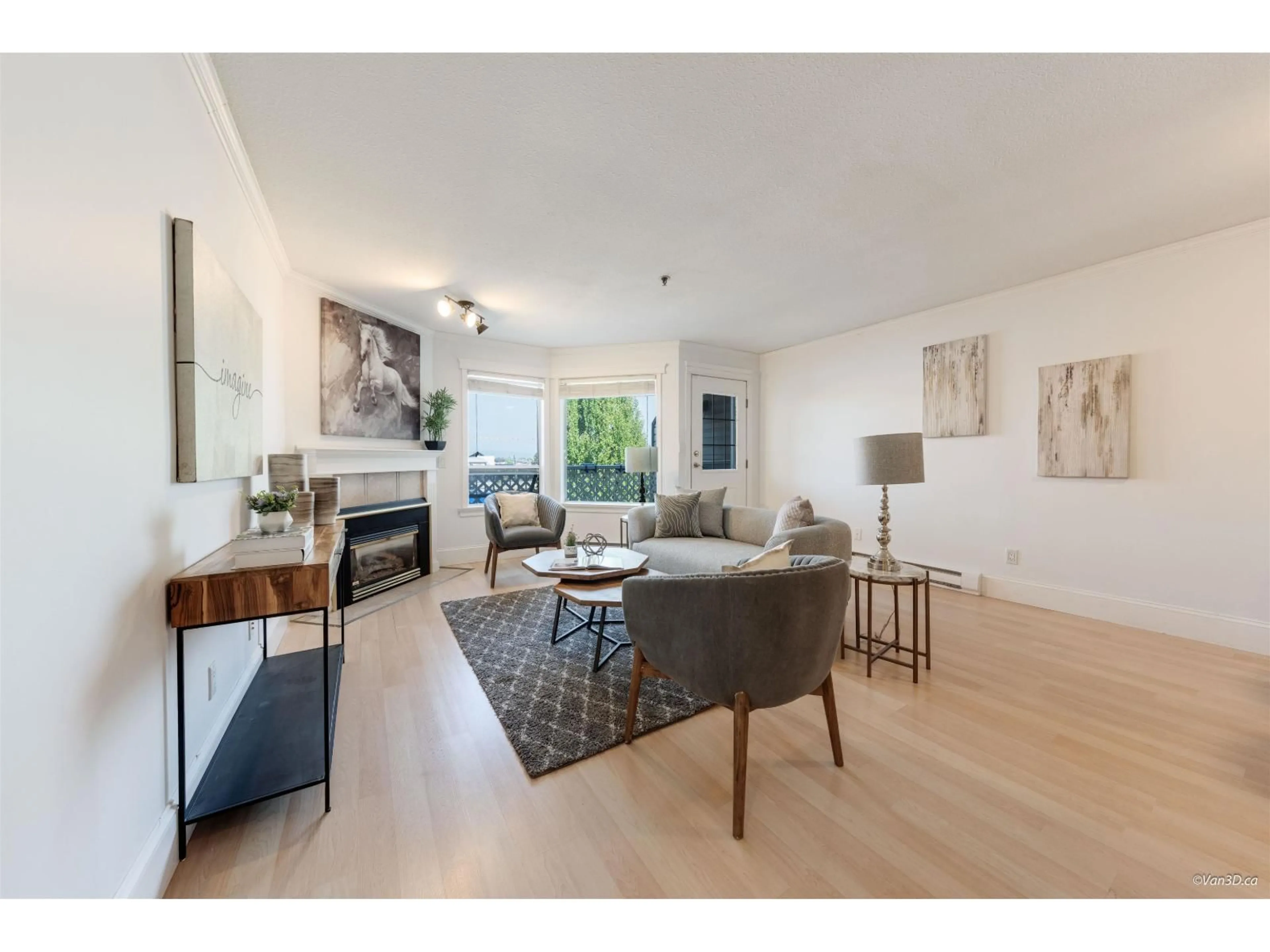 Living room with furniture, wood/laminate floor for 305 - 5710 201, Langley British Columbia V3A8A8
