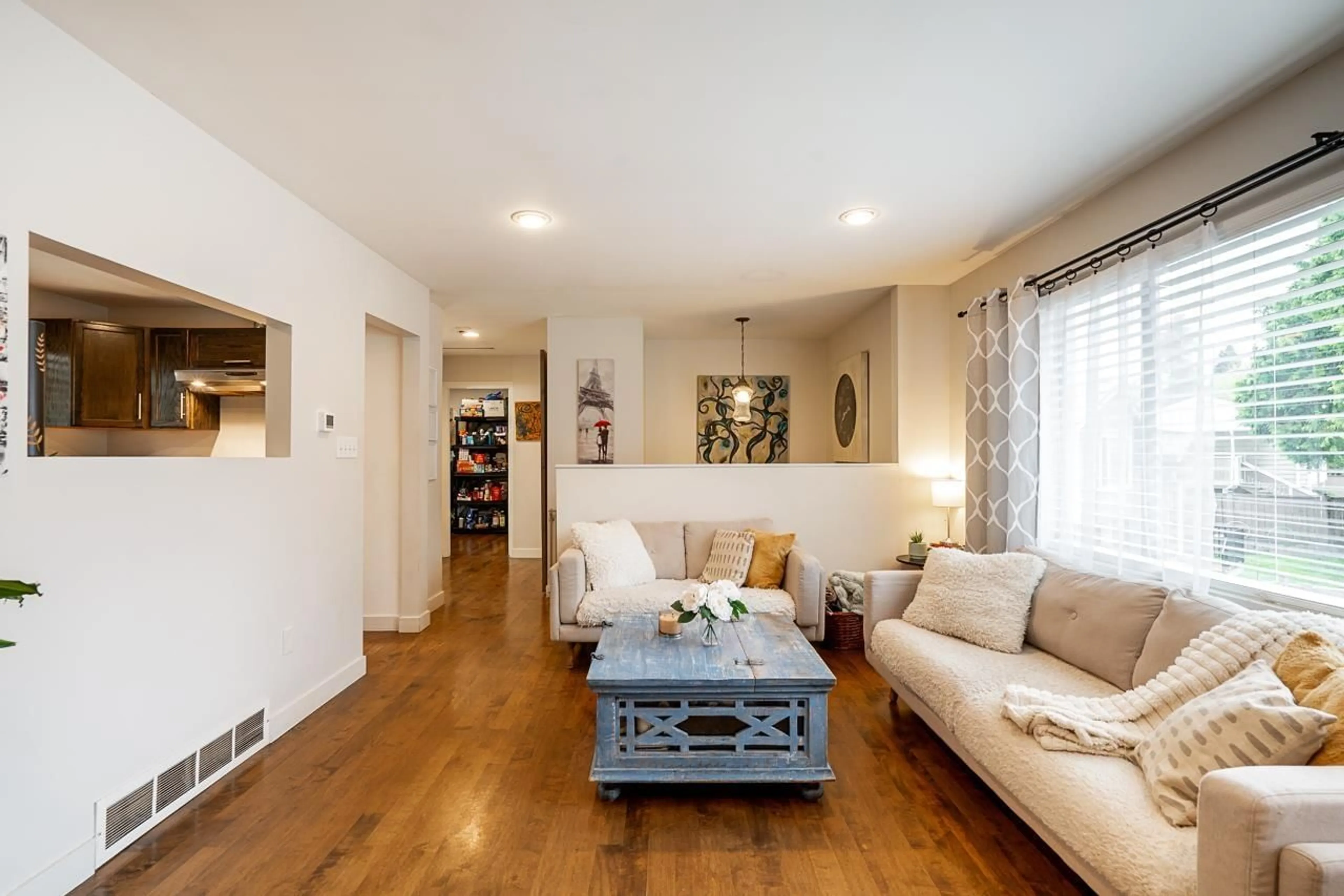 Living room with furniture, wood/laminate floor for 14366 101, Surrey British Columbia V3T5C8