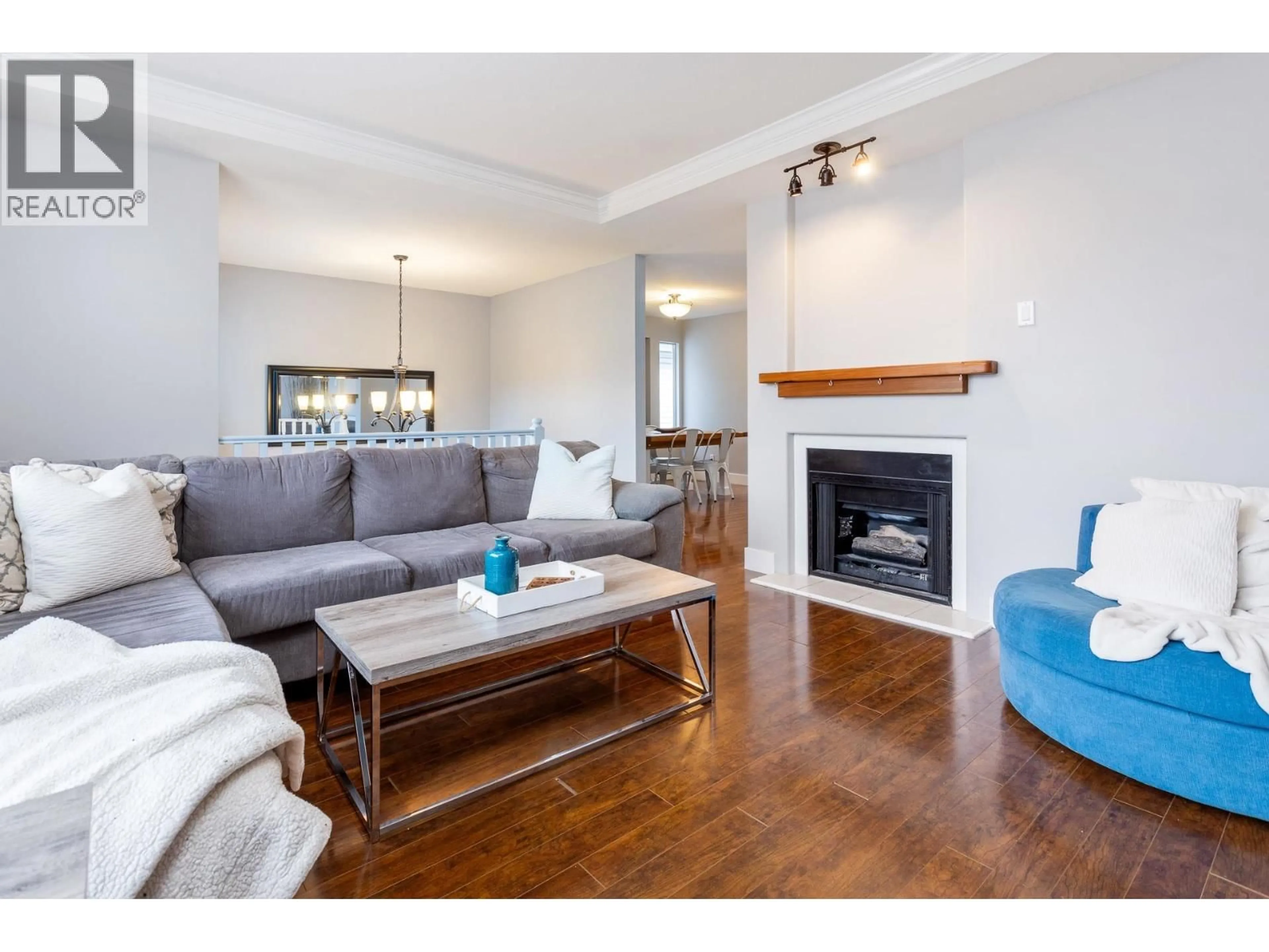 Living room with furniture, wood/laminate floor for 2230 HAWTHORNE AVENUE, Port Coquitlam British Columbia V3C1W6