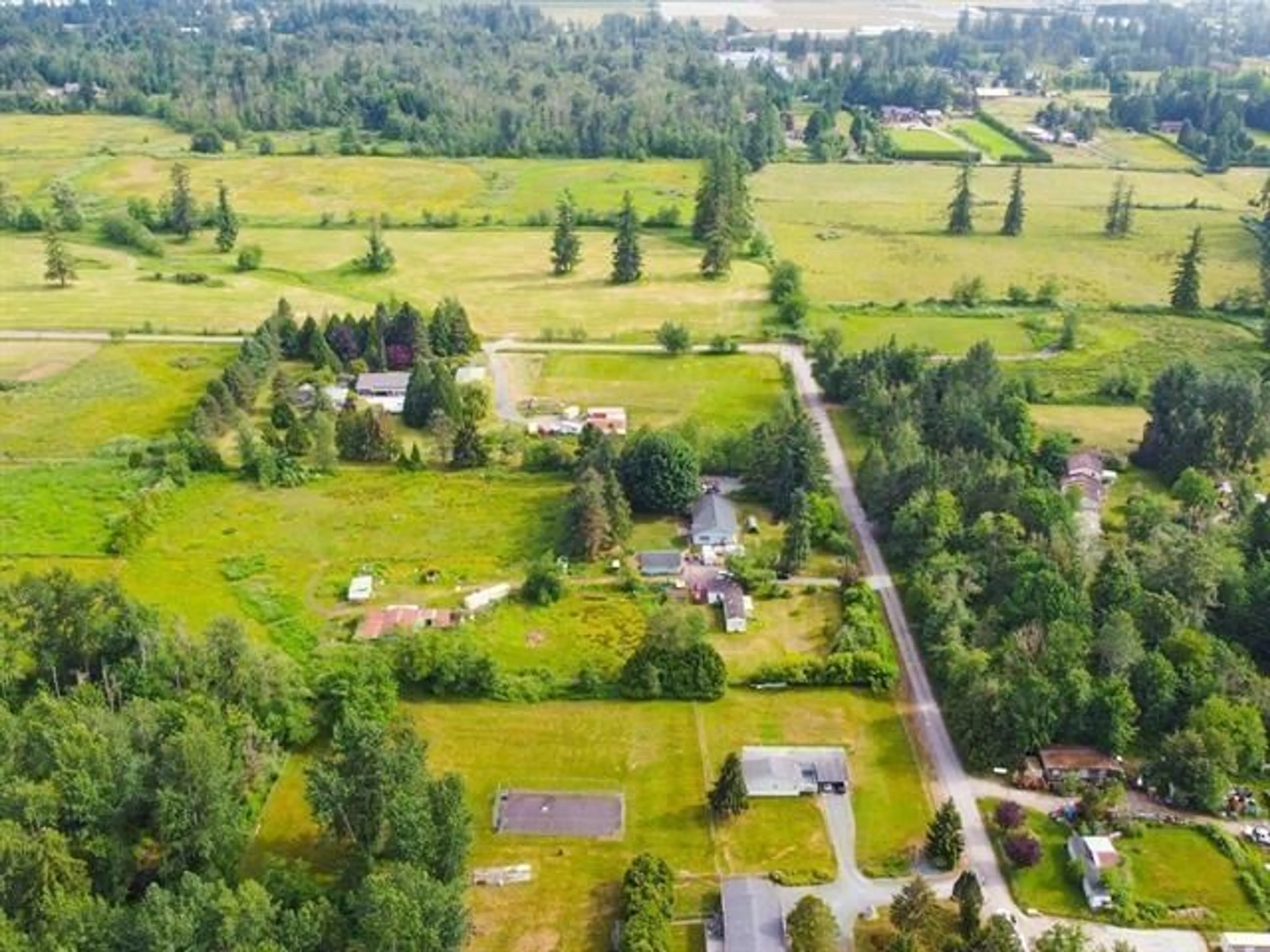 A pic from outside/outdoor area/front of a property/back of a property/a pic from drone, unknown for 3050 228, Langley British Columbia V2Z3B1