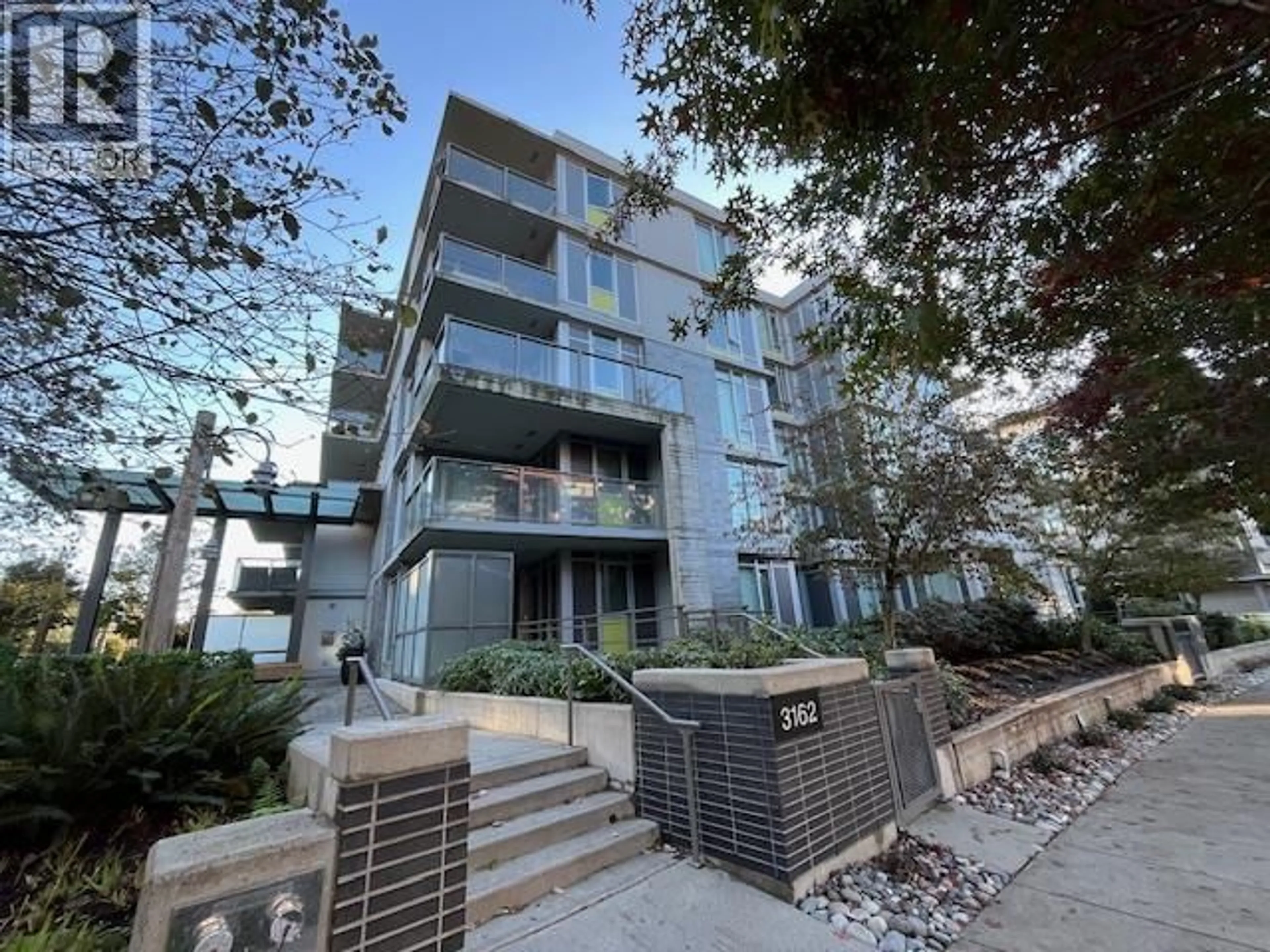 A pic from outside/outdoor area/front of a property/back of a property/a pic from drone, unknown for 106 - 3162 RIVERWALK AVENUE, Vancouver British Columbia V5S0B7