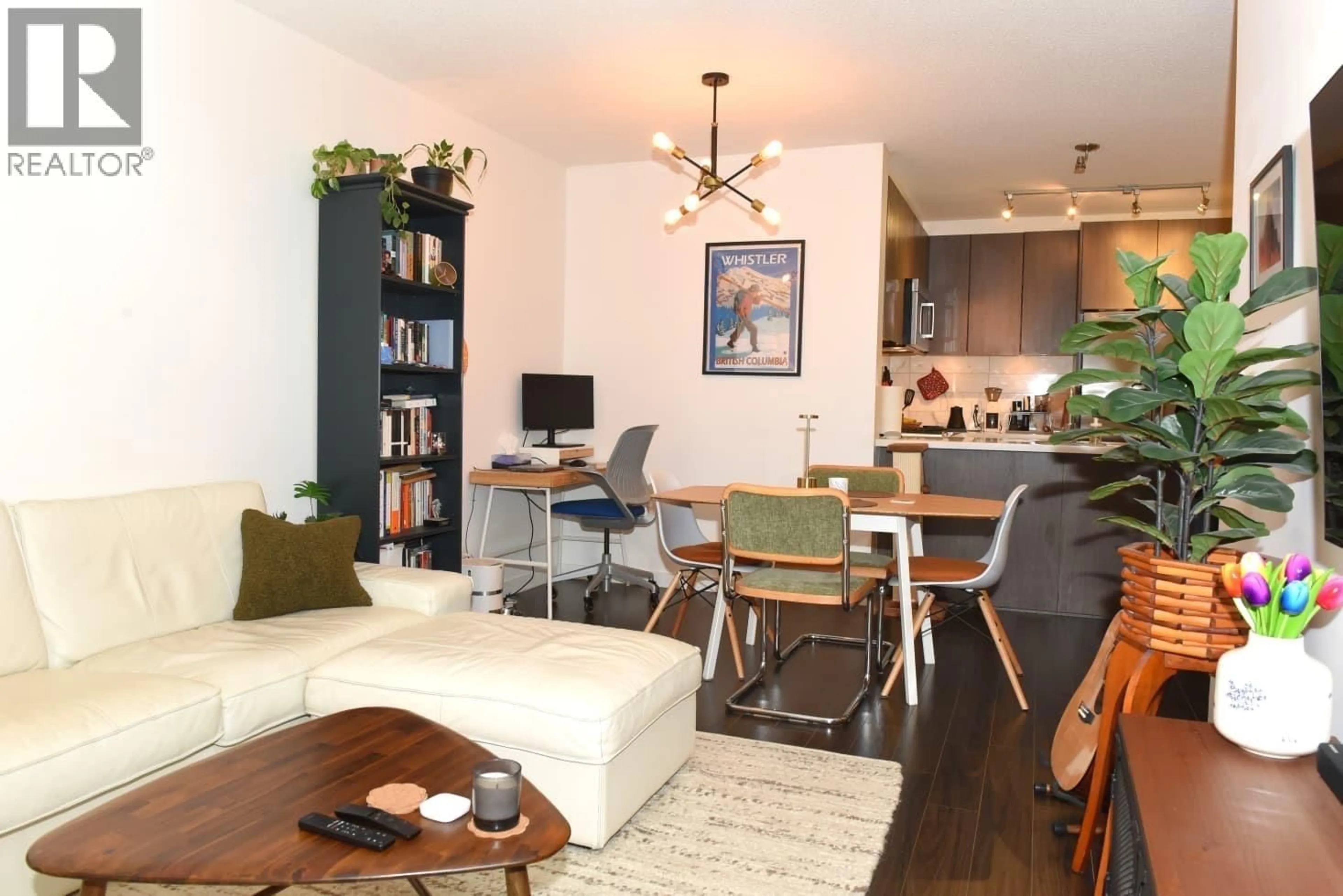 Living room with furniture, wood/laminate floor for 106 - 3162 RIVERWALK AVENUE, Vancouver British Columbia V5S0B7