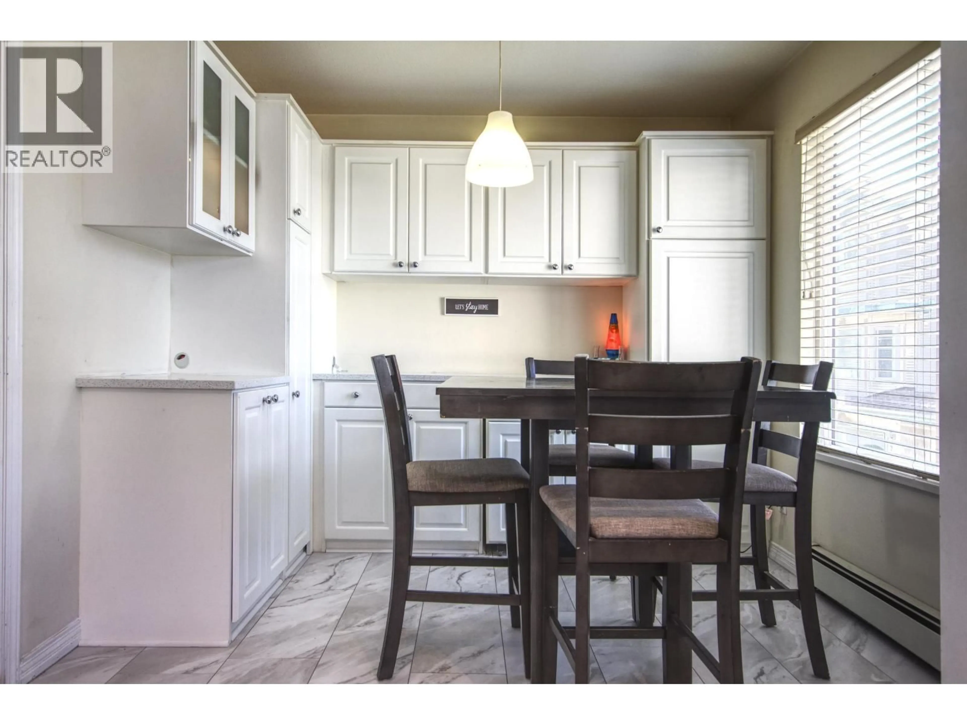 Open concept kitchen, wood/laminate floor for 44 - 22800 WINDSOR COURT, Richmond British Columbia V6V2X6