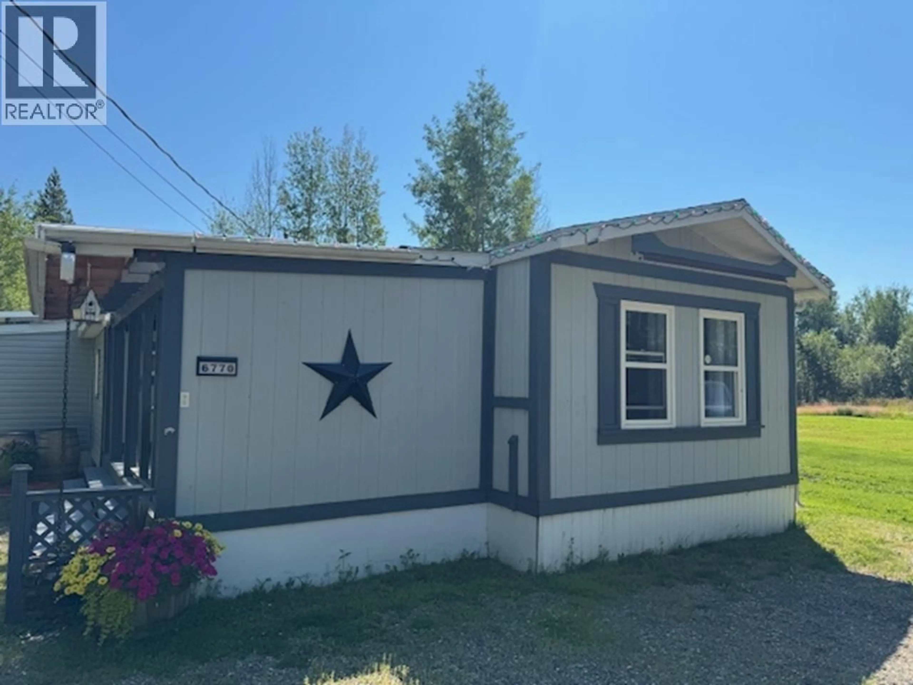 Home with vinyl exterior material, street for 6770 PARSNIP ROAD, Prince George British Columbia V2N6E8