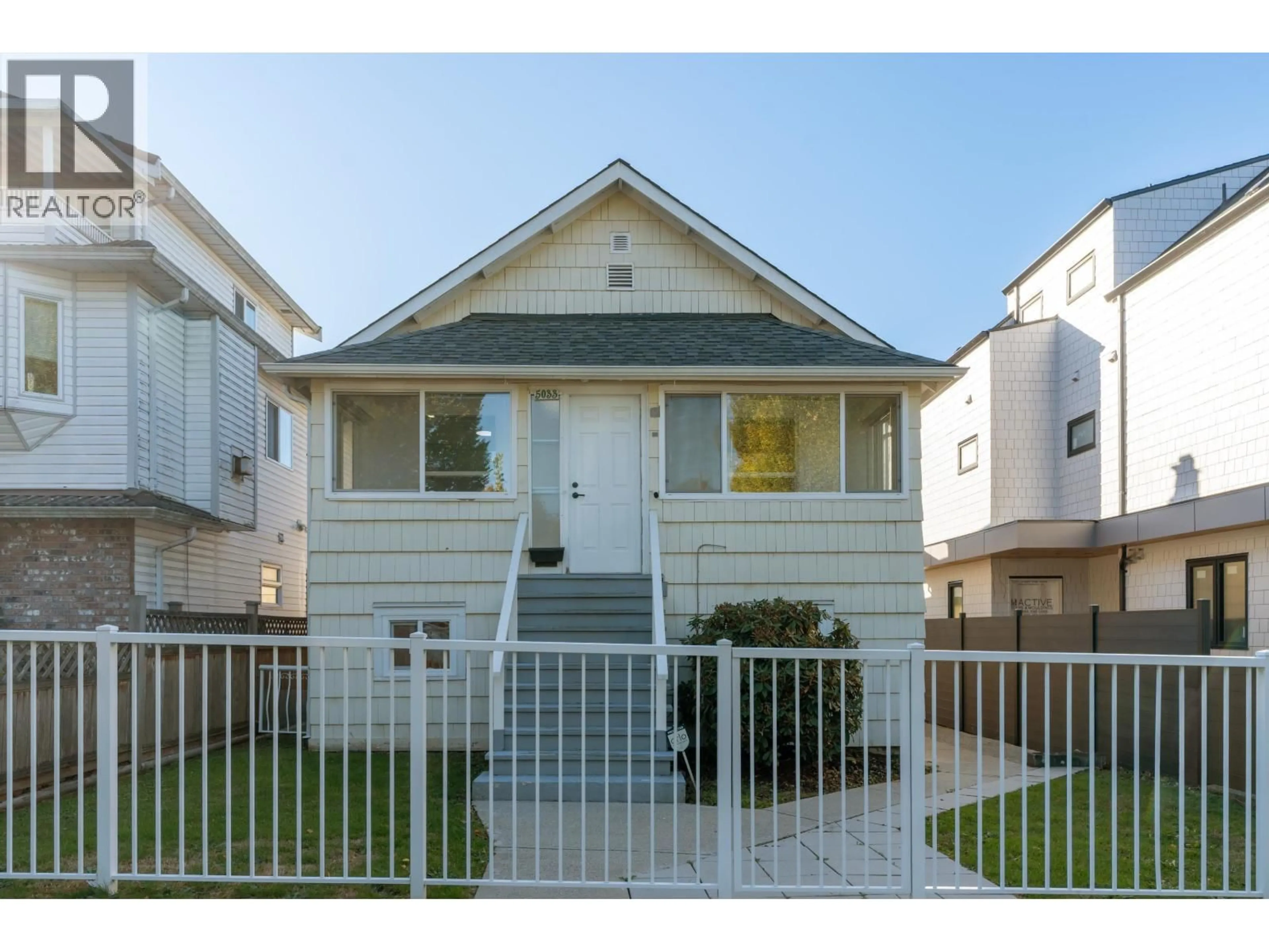 Home with vinyl exterior material, street for 5033 ROSS STREET, Vancouver British Columbia V5W3K6