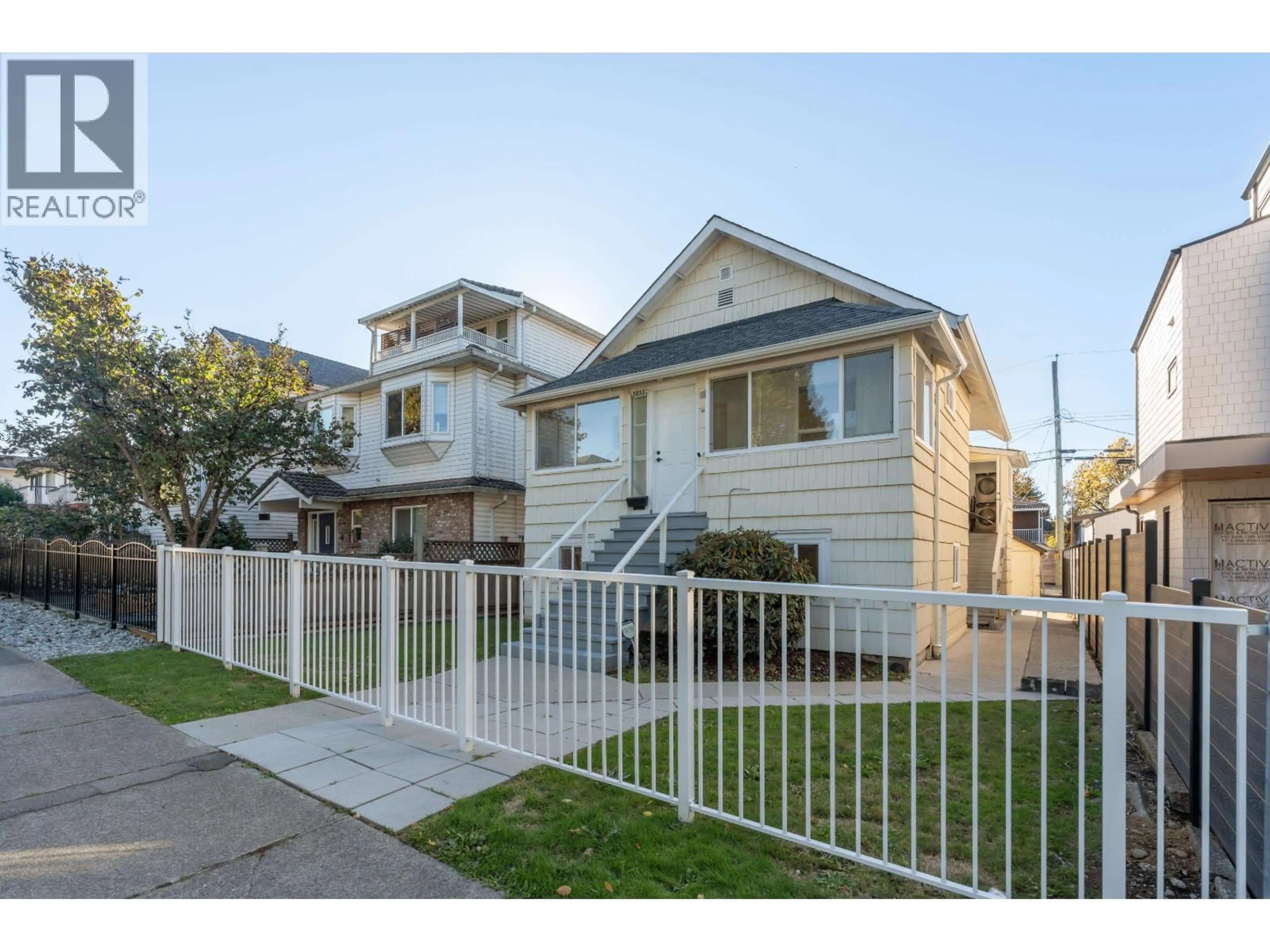 Home with vinyl exterior material, street for 5033 ROSS STREET, Vancouver British Columbia V5W3K6