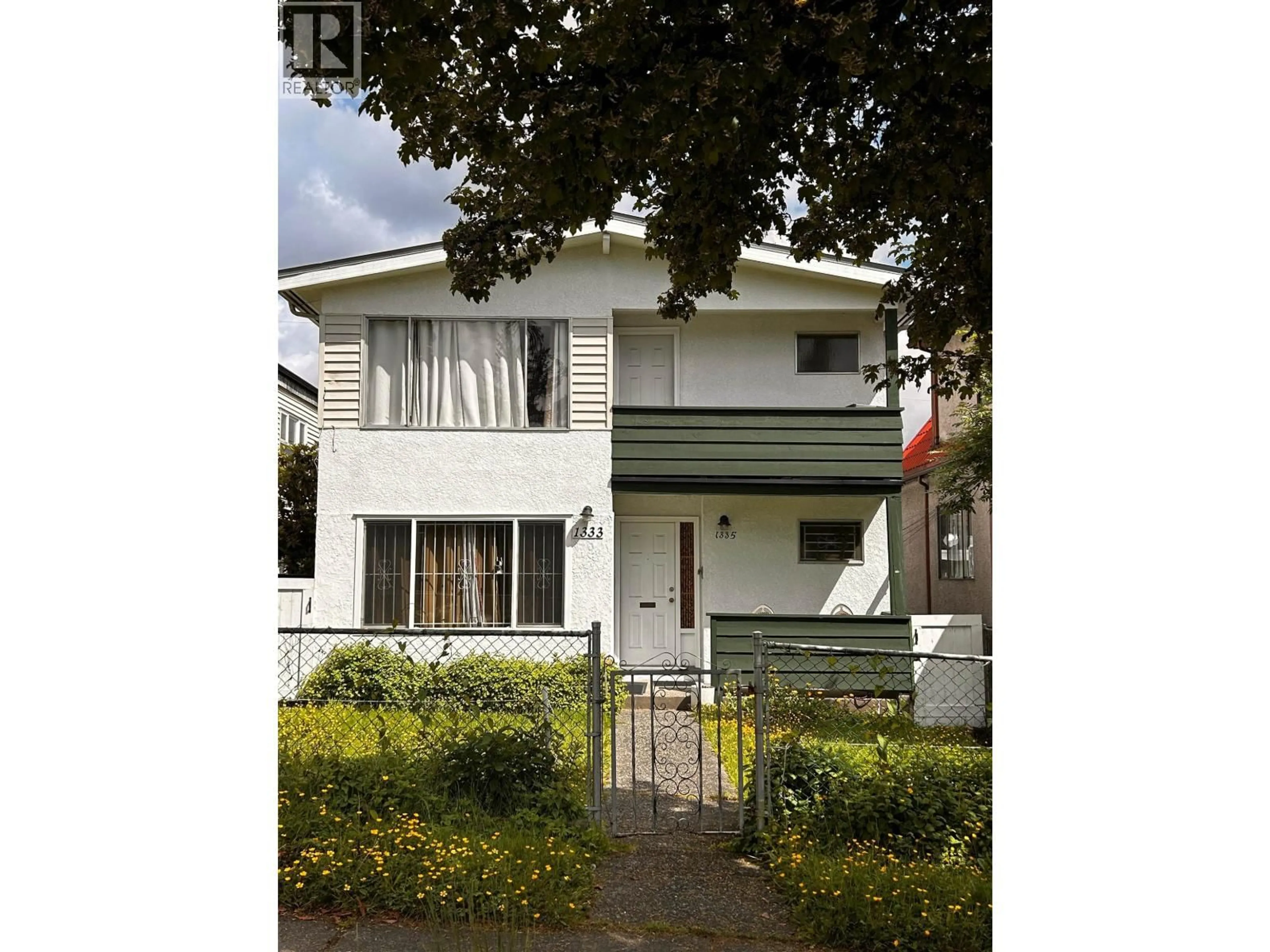 Home with vinyl exterior material, street for 1333 14TH AVENUE, Vancouver British Columbia V5N2C7