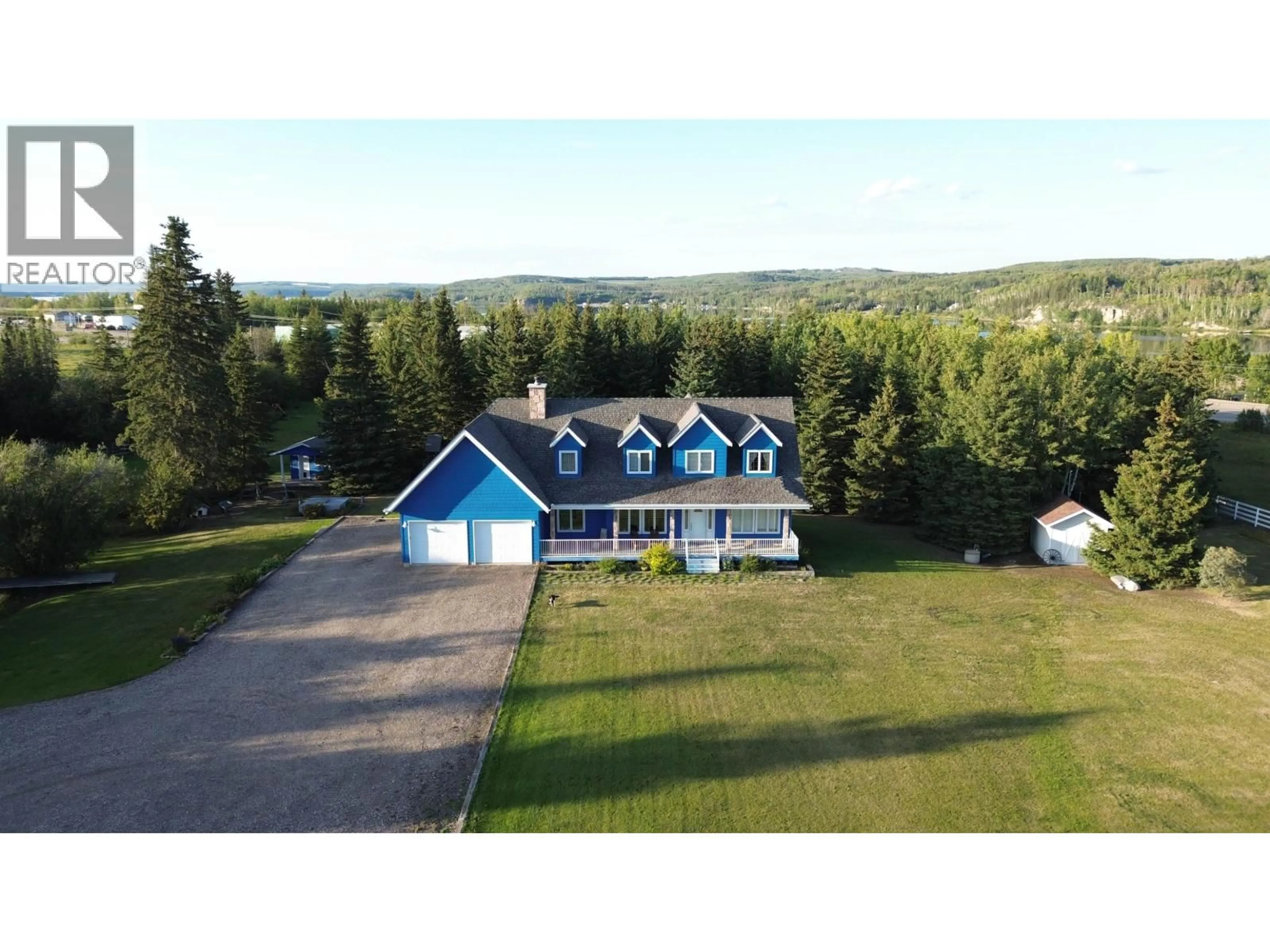 A pic from outside/outdoor area/front of a property/back of a property/a pic from drone, mountain view for 12762 OLD HOPE ROAD, Charlie Lake British Columbia V0C1H0