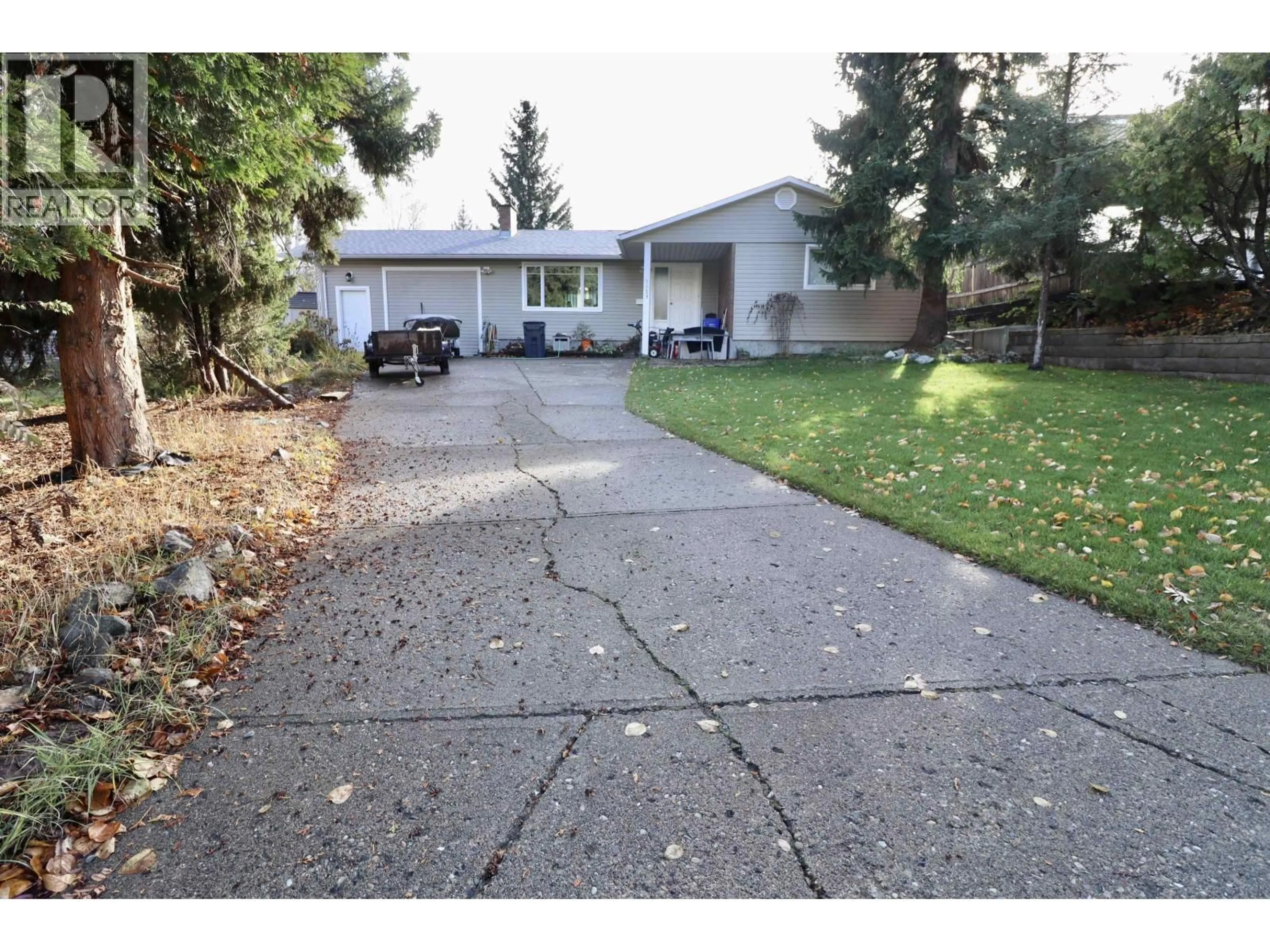 A pic from outside/outdoor area/front of a property/back of a property/a pic from drone, street for 7129 HARTFORD CRESCENT, Prince George British Columbia V2N2W2