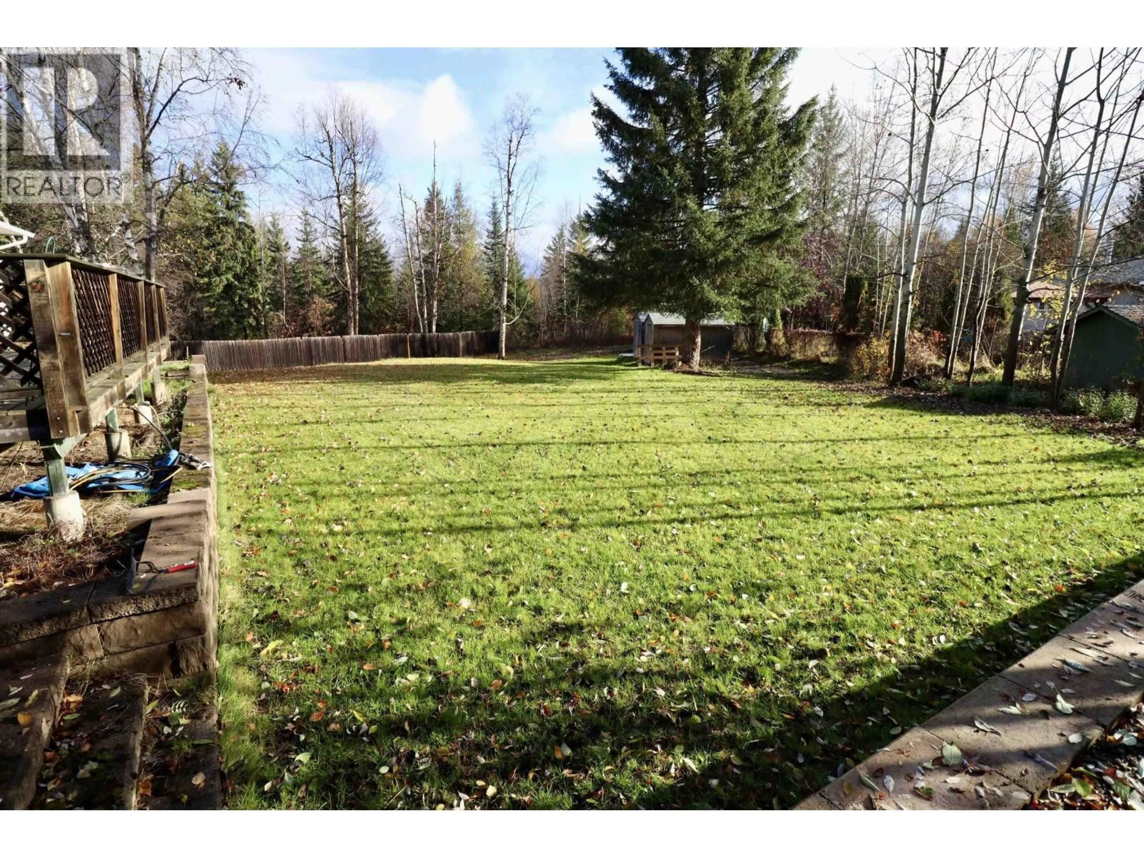 A pic from outside/outdoor area/front of a property/back of a property/a pic from drone, forest/trees view for 7129 HARTFORD CRESCENT, Prince George British Columbia V2N2W2