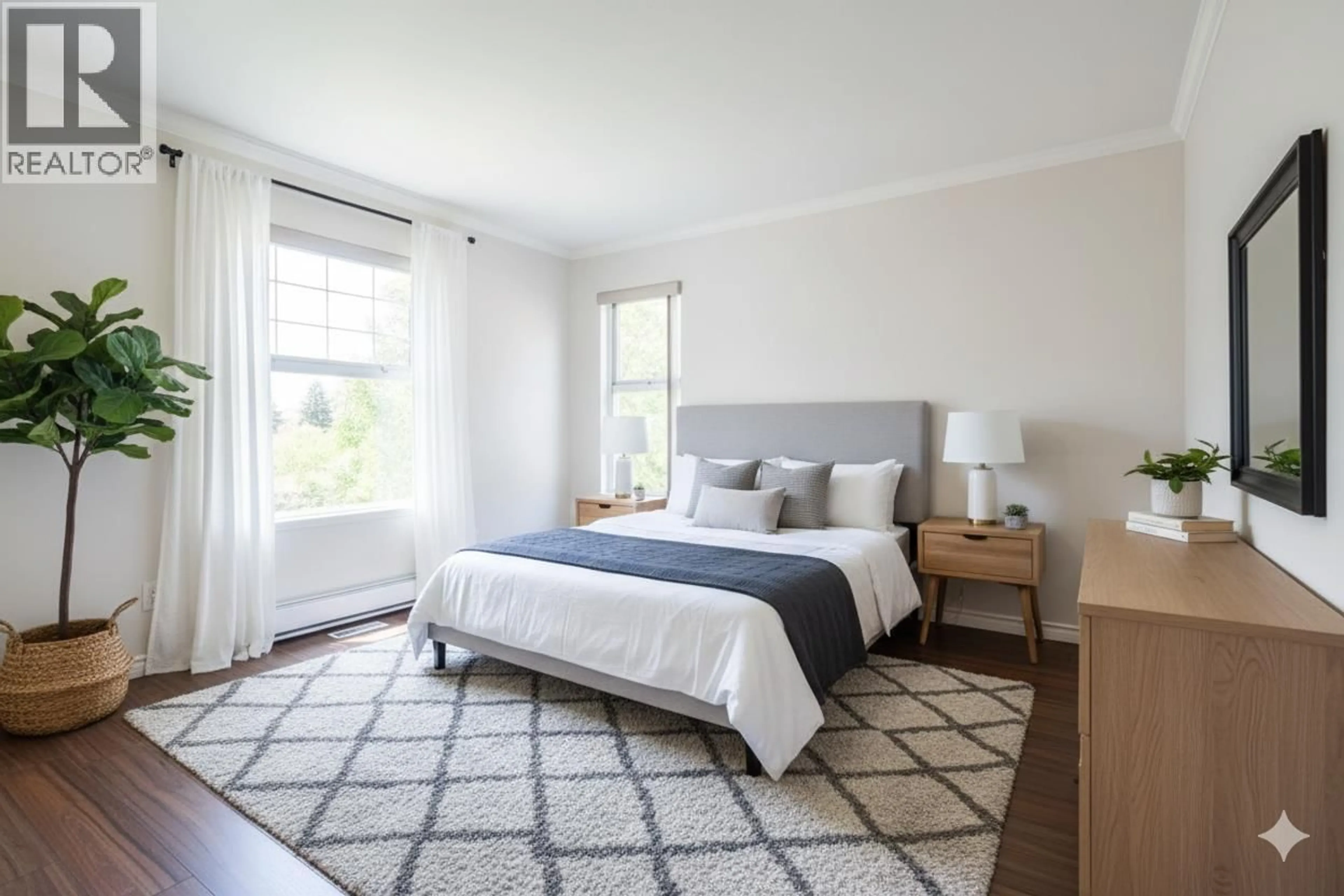 Bedroom with bed, carpet floor for 102 - 135 ELEVENTH STREET, New Westminster British Columbia V3M4C7