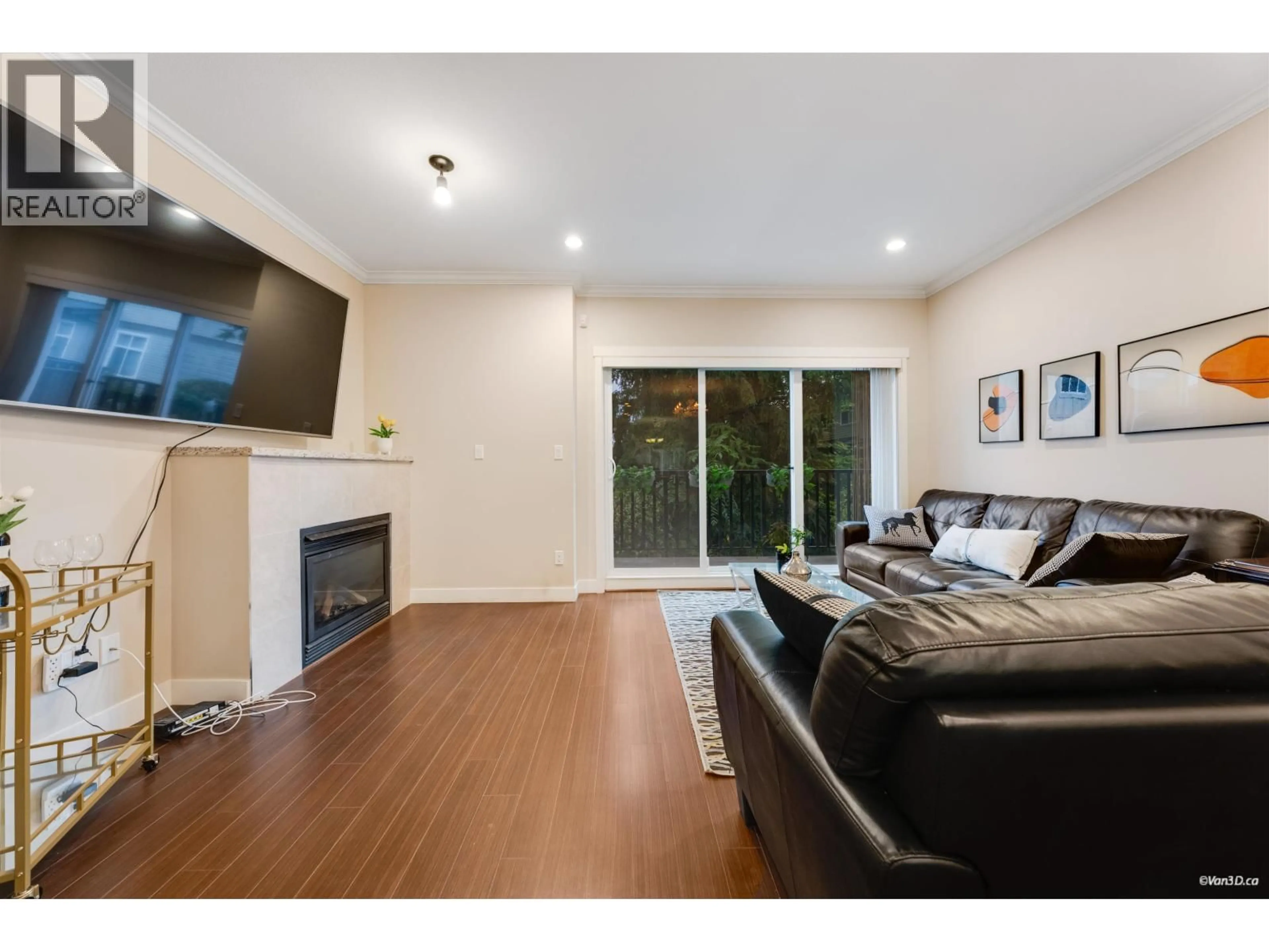 Living room with furniture, wood/laminate floor for 31 - 7051 ASH STREET, Richmond British Columbia V6Y2R9