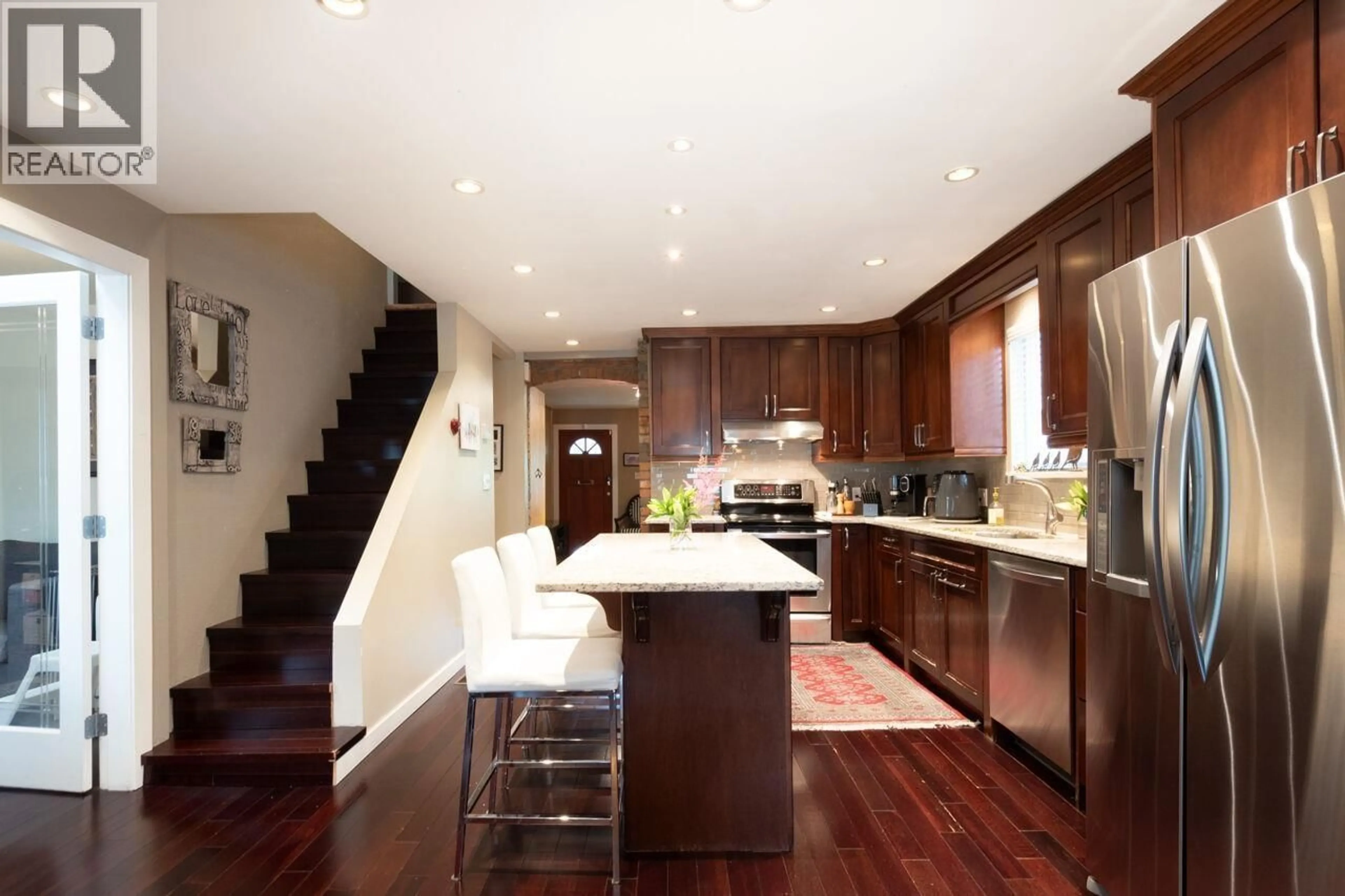 Open concept kitchen, wood/laminate floor for 2466 ETON STREET, Vancouver British Columbia V5K1J5