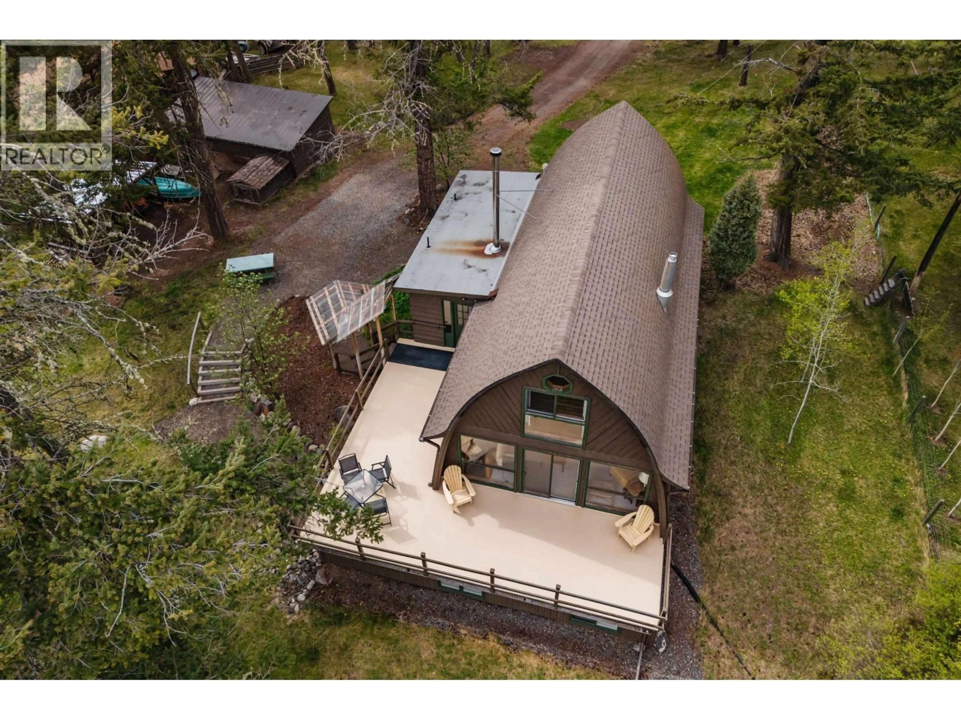 A pic from outside/outdoor area/front of a property/back of a property/a pic from drone, unknown for 5359 ANNAHAM CRESCENT, 108 Mile Ranch British Columbia V0K2Z0