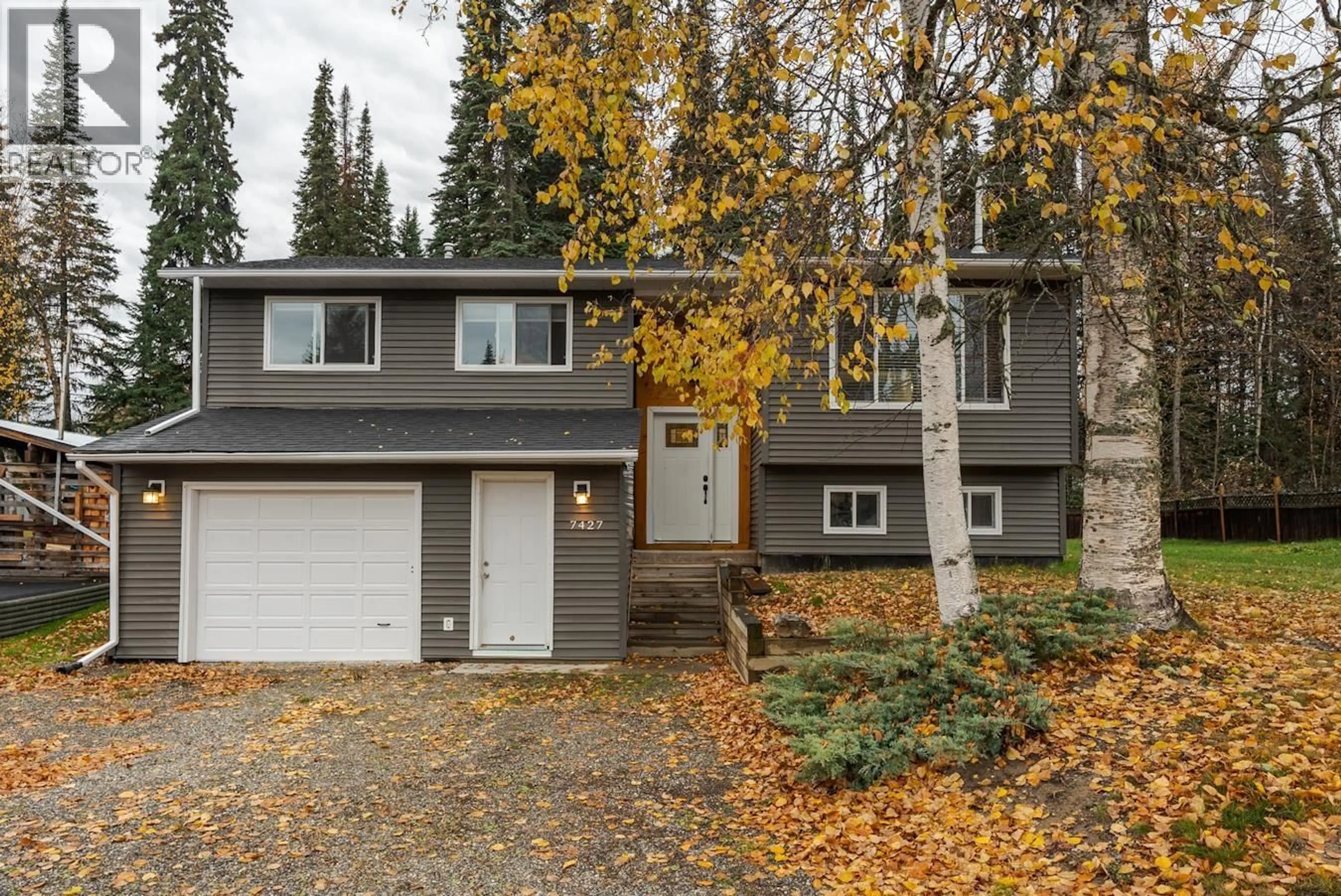 Home with vinyl exterior material, street for 7427 PEARL DRIVE, Prince George British Columbia V2K4K3