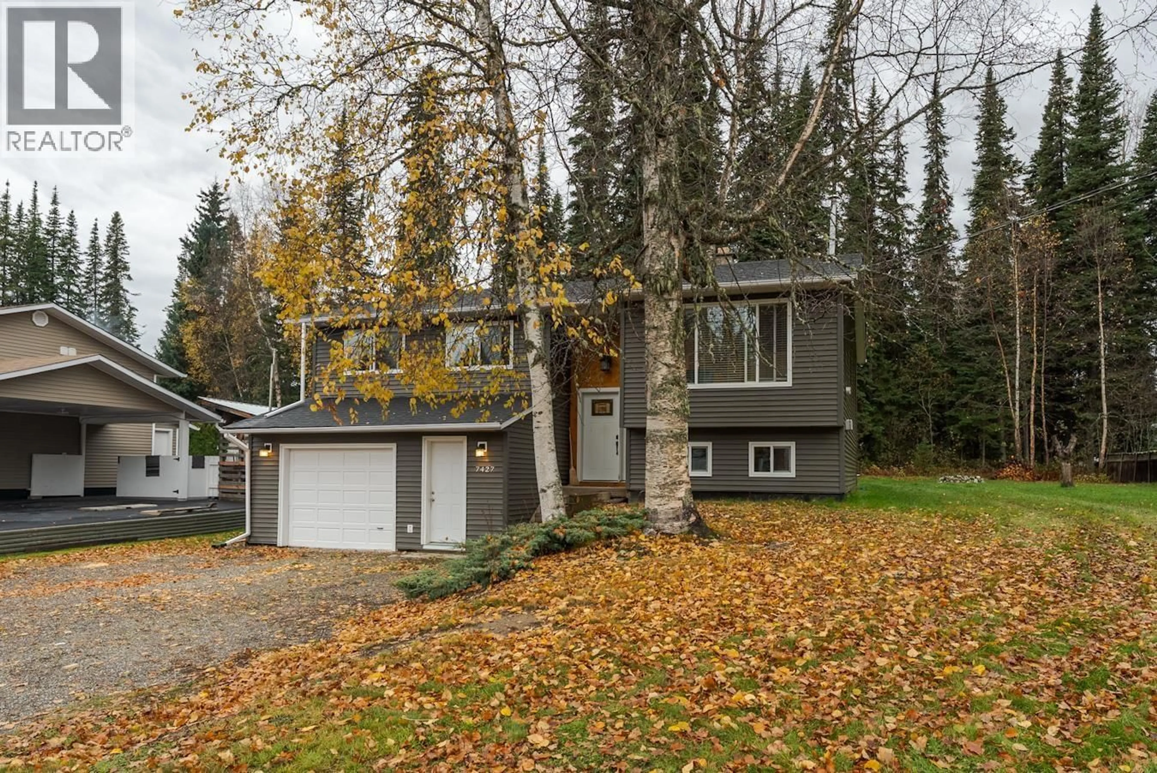 Home with vinyl exterior material, street for 7427 PEARL DRIVE, Prince George British Columbia V2K4K3