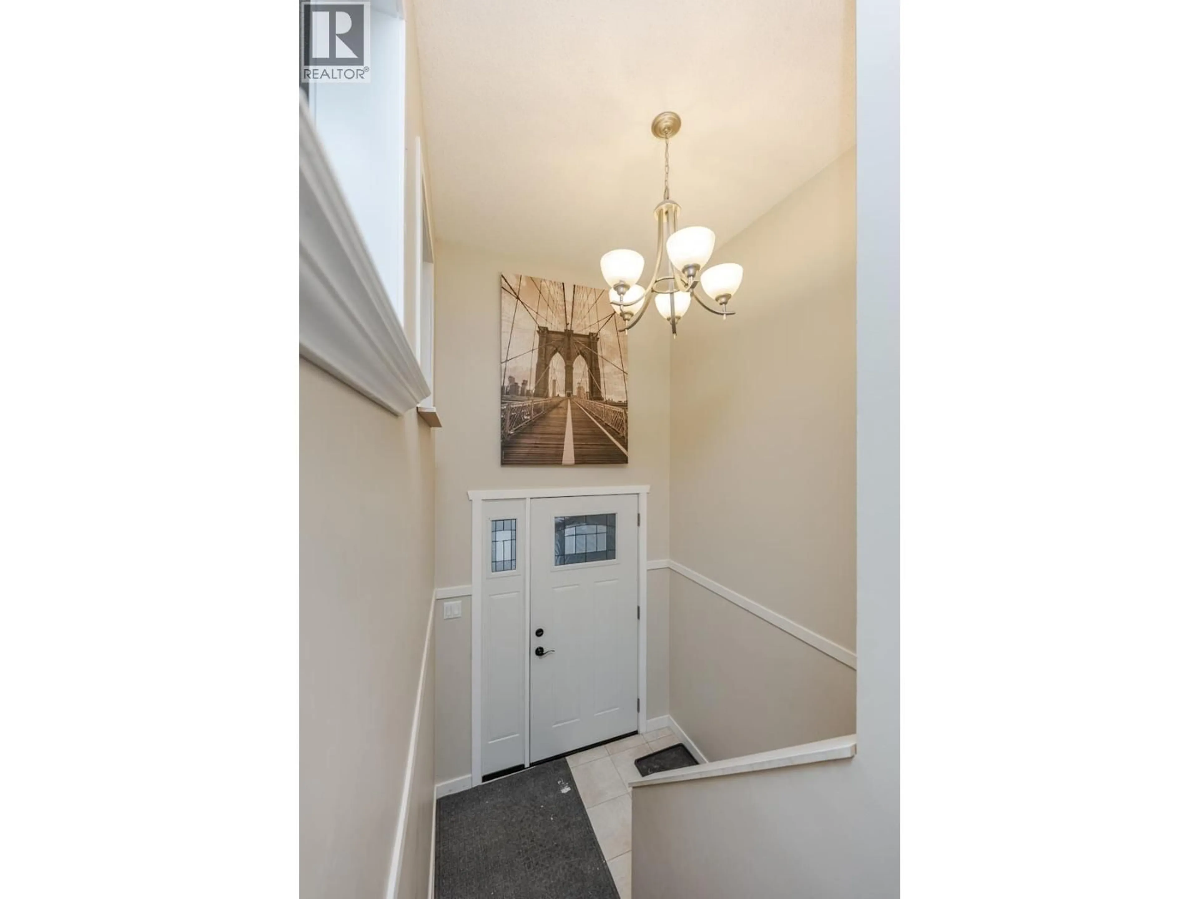 Indoor foyer for 7427 PEARL DRIVE, Prince George British Columbia V2K4K3