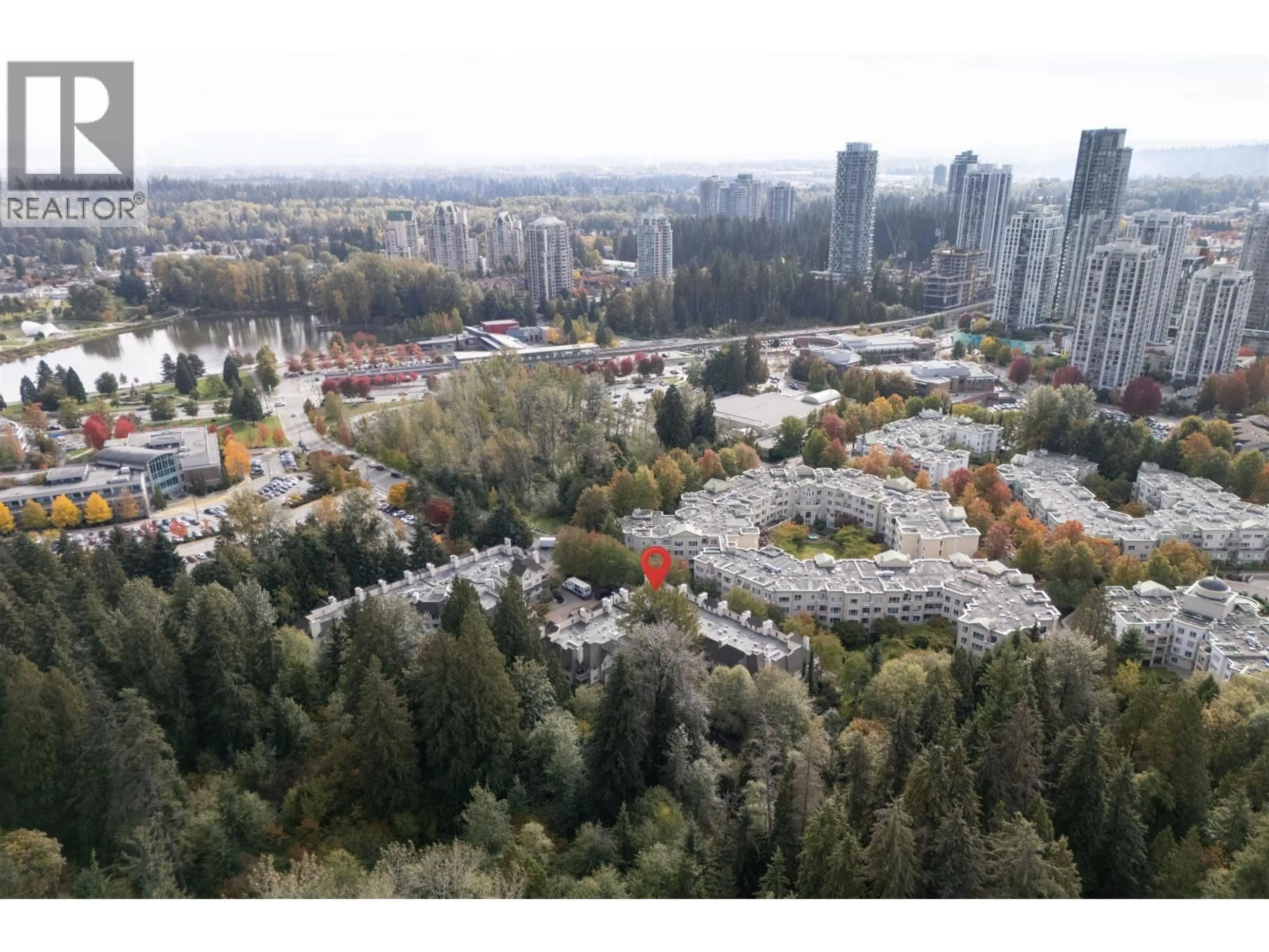 A pic from outside/outdoor area/front of a property/back of a property/a pic from drone, city buildings view from balcony for 113 - 1242 TOWN CENTRE BOULEVARD, Coquitlam British Columbia V3B7R6