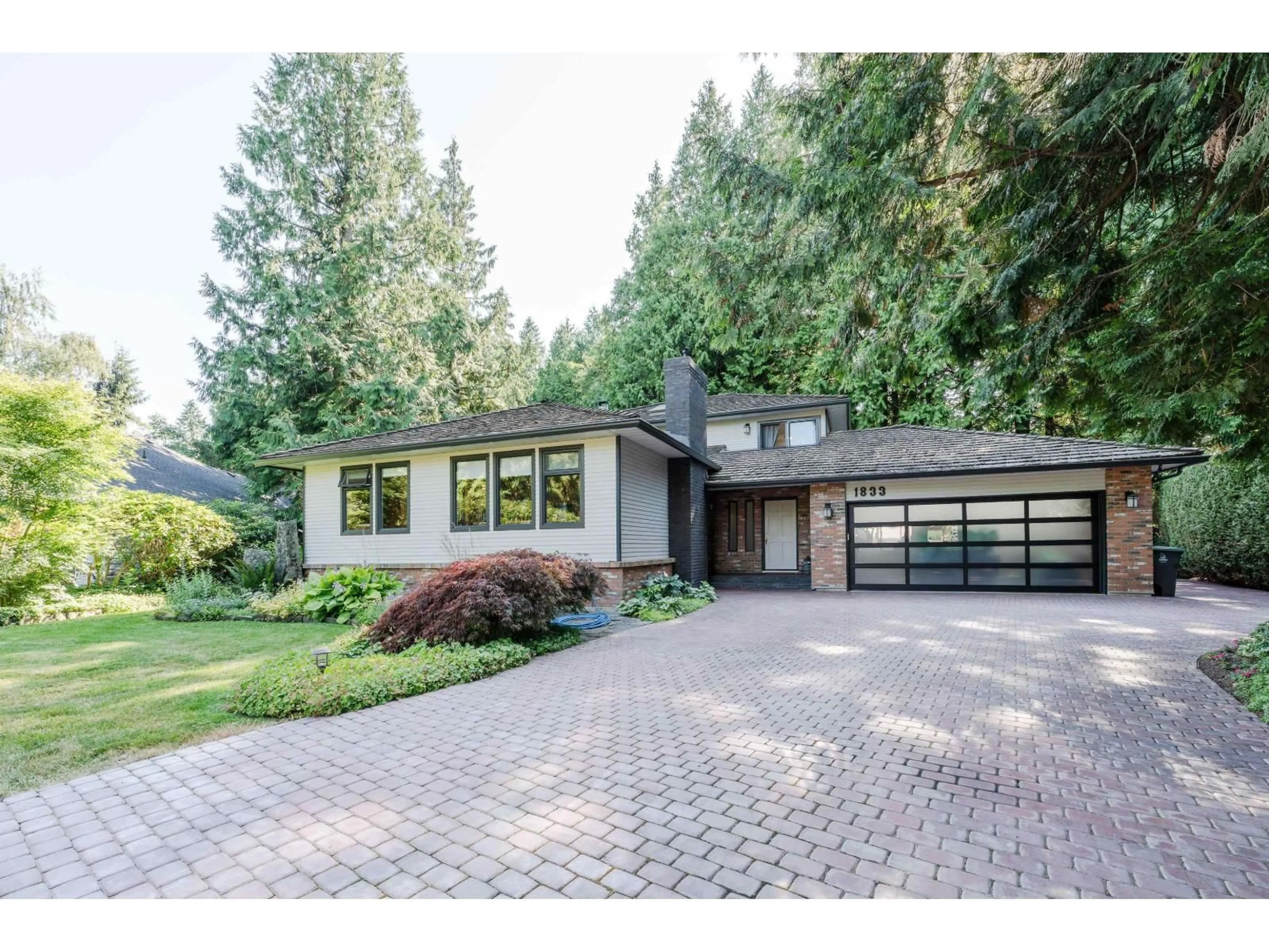 Home with brick exterior material, street for 1833 133A, Surrey British Columbia V4A7M4