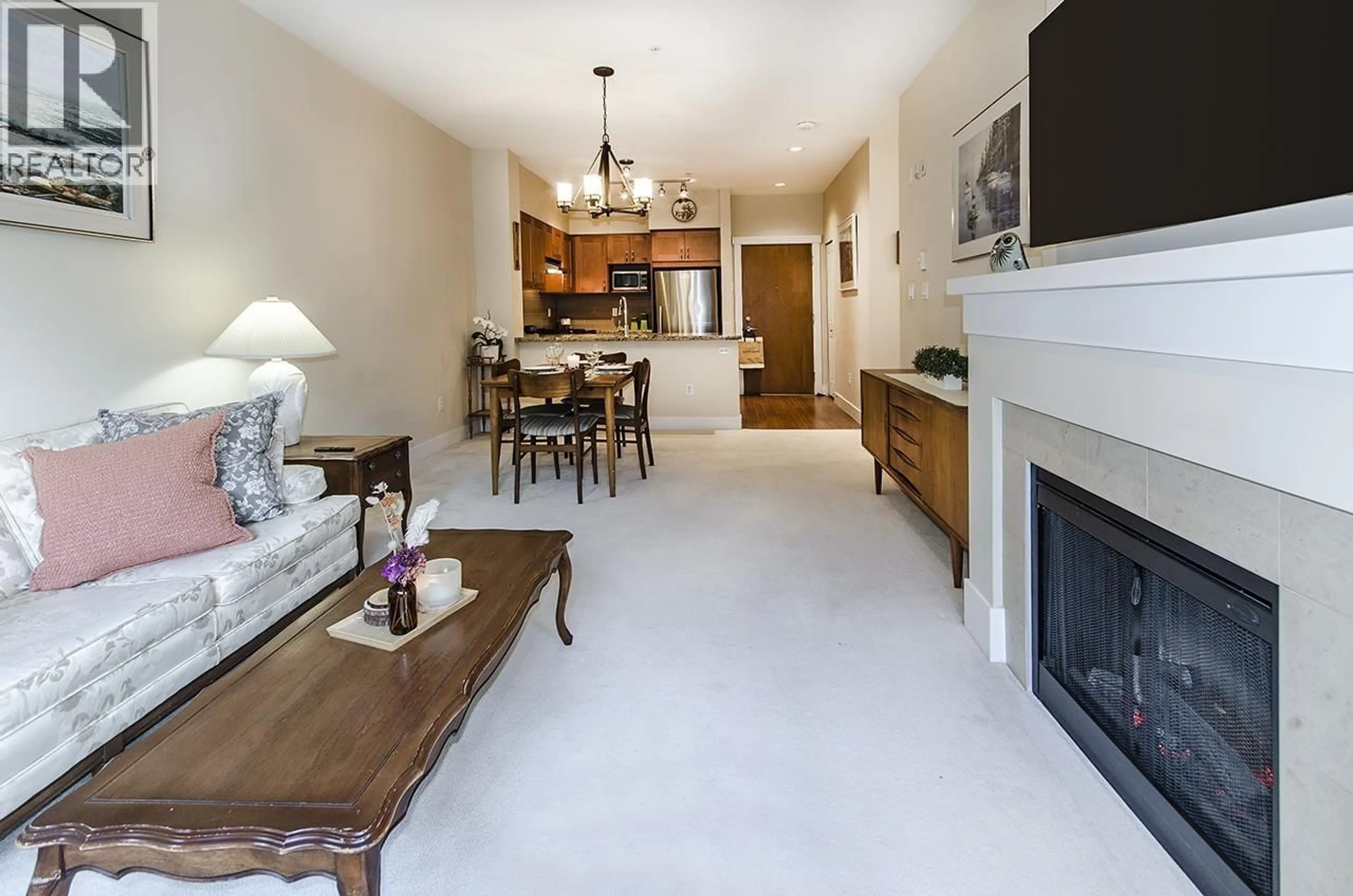 Living room with furniture, ceramic/tile floor for 106 - 1111 27TH STREET, North Vancouver British Columbia V7J1S3