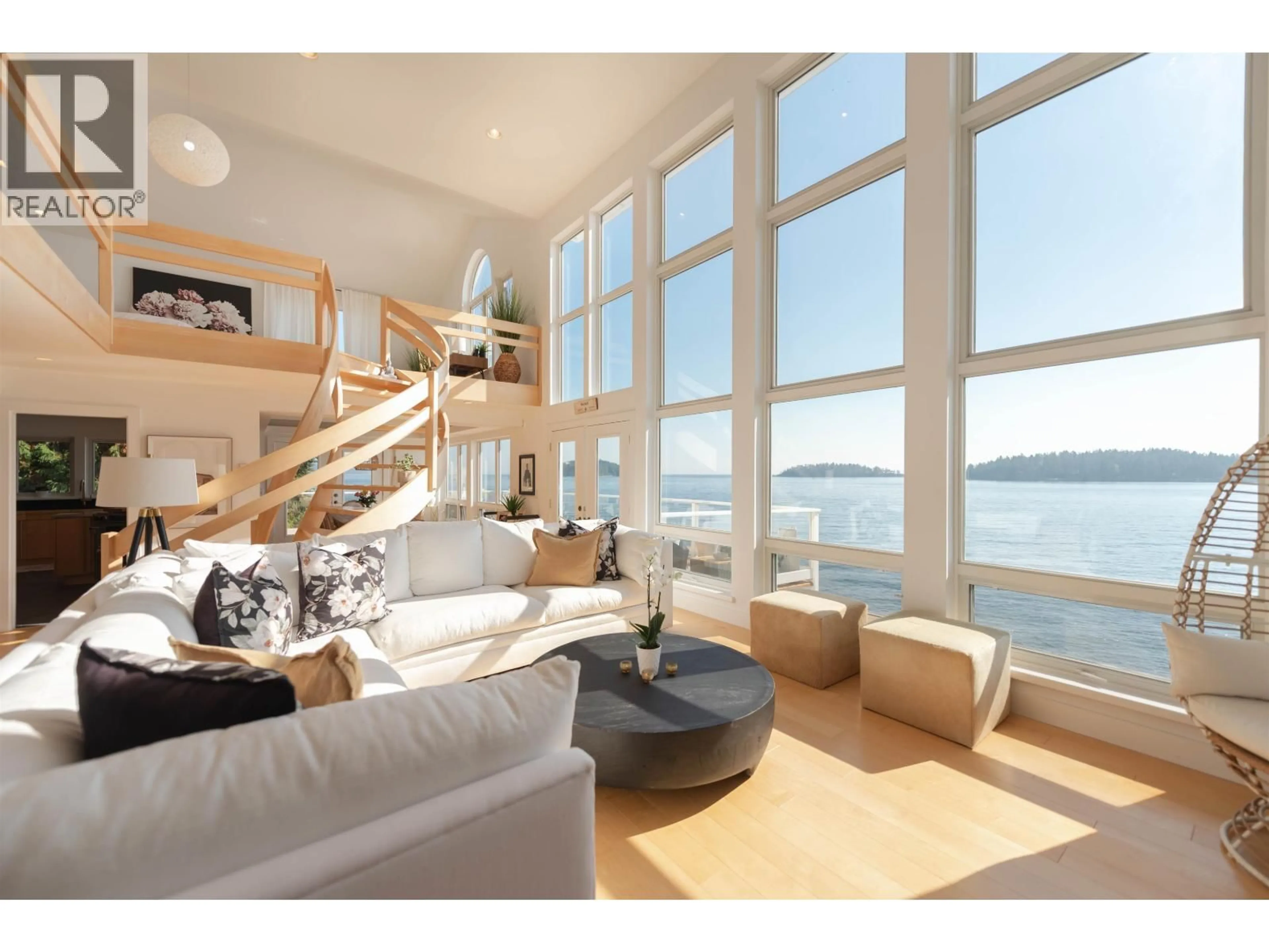 Living room with furniture, wood/laminate floor for 6655 SUNSHINE COAST HIGHWAY, Sechelt British Columbia V7Z0M9