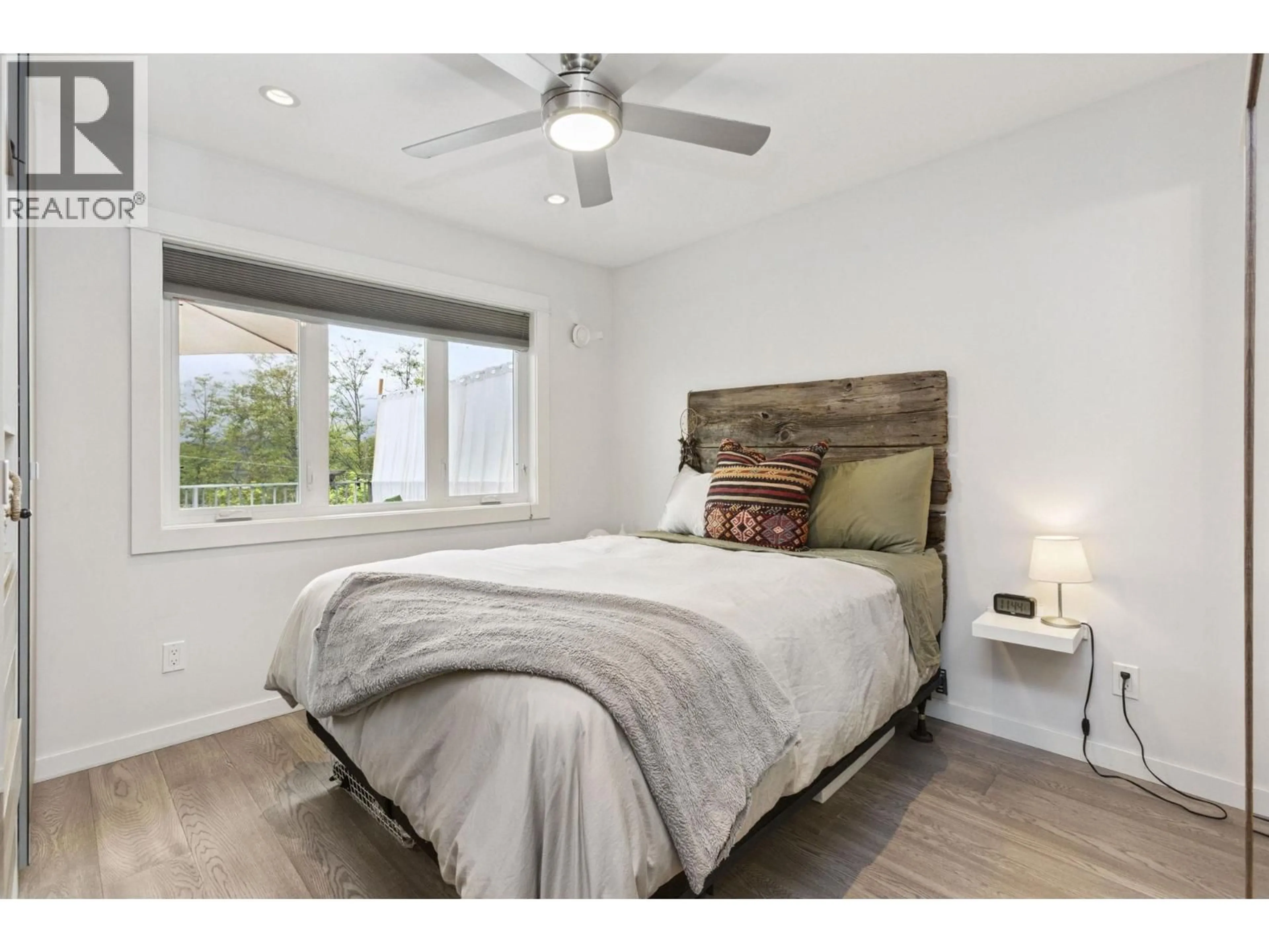 Bedroom with bed, wood/laminate floor for 4137 YALE STREET, Burnaby British Columbia V5C1R2