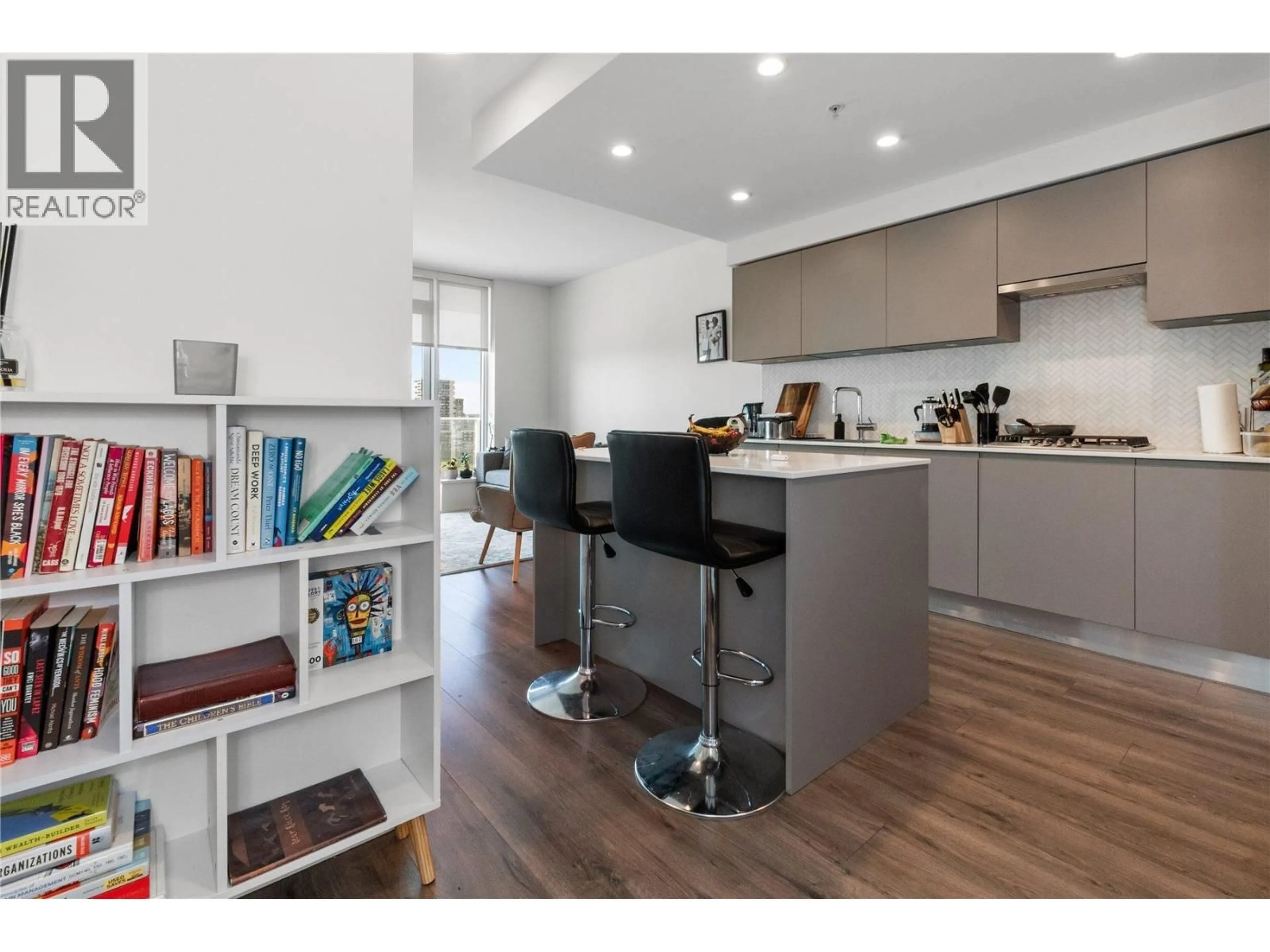 Open concept kitchen, wood/laminate floor for 609 - 3833 EVERGREEN PLACE, Burnaby British Columbia V3J0M2