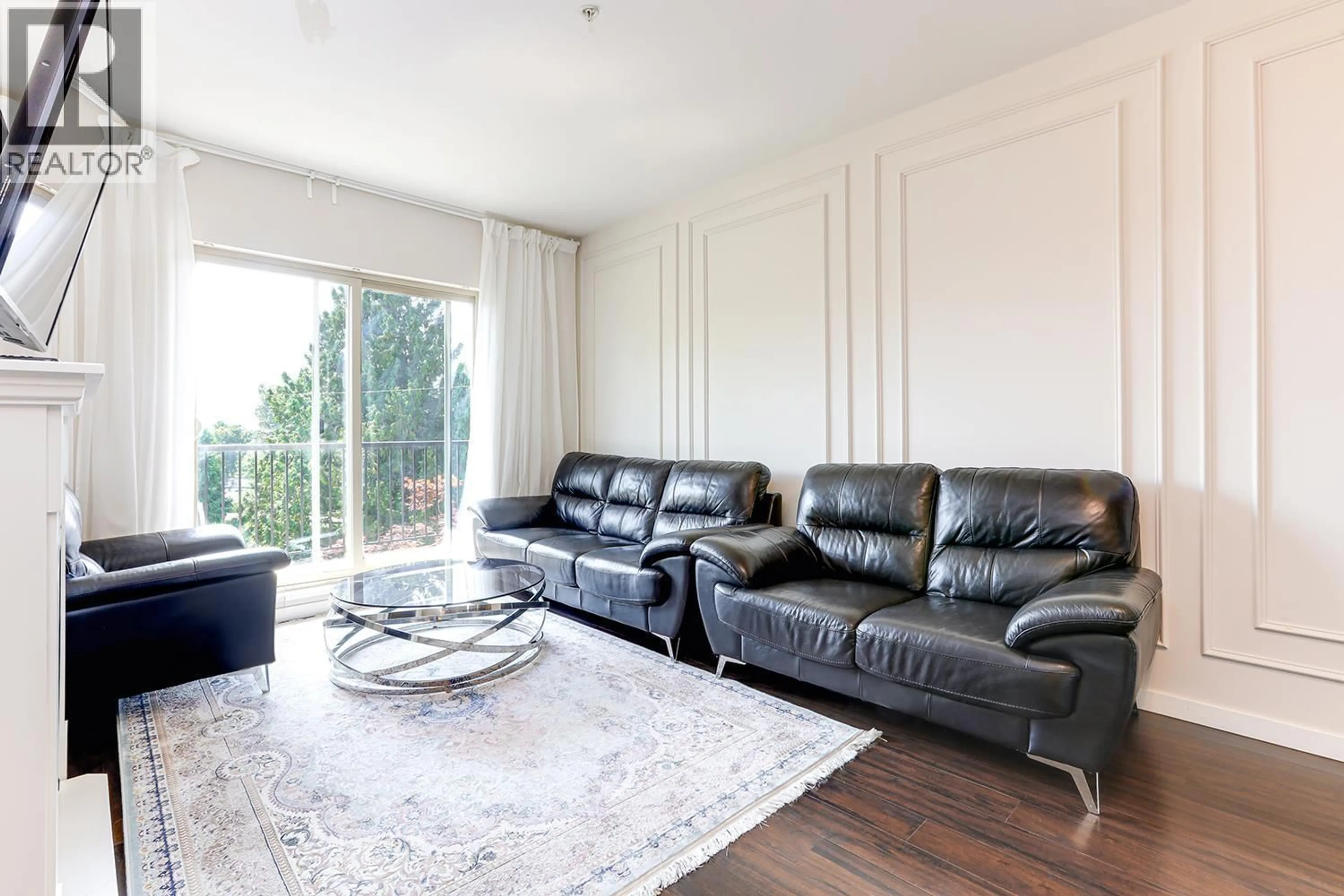 Living room with furniture, wood/laminate floor for 307 - 22290 NORTH AVENUE, Maple Ridge British Columbia V2X8Z8