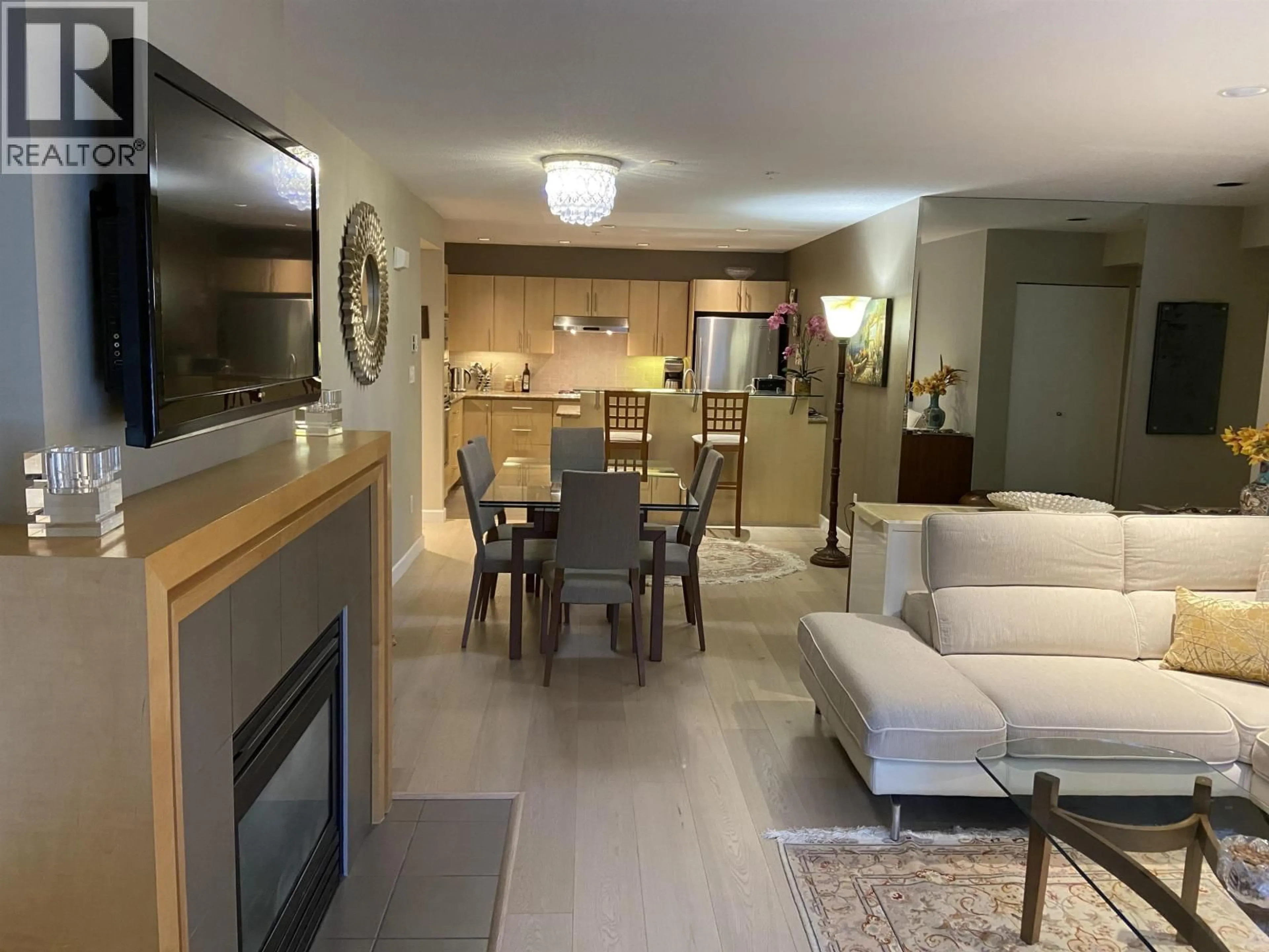 Living room with furniture, unknown for 104 - 3750 EDGEMONT BOULEVARD, North Vancouver British Columbia V7R2P8