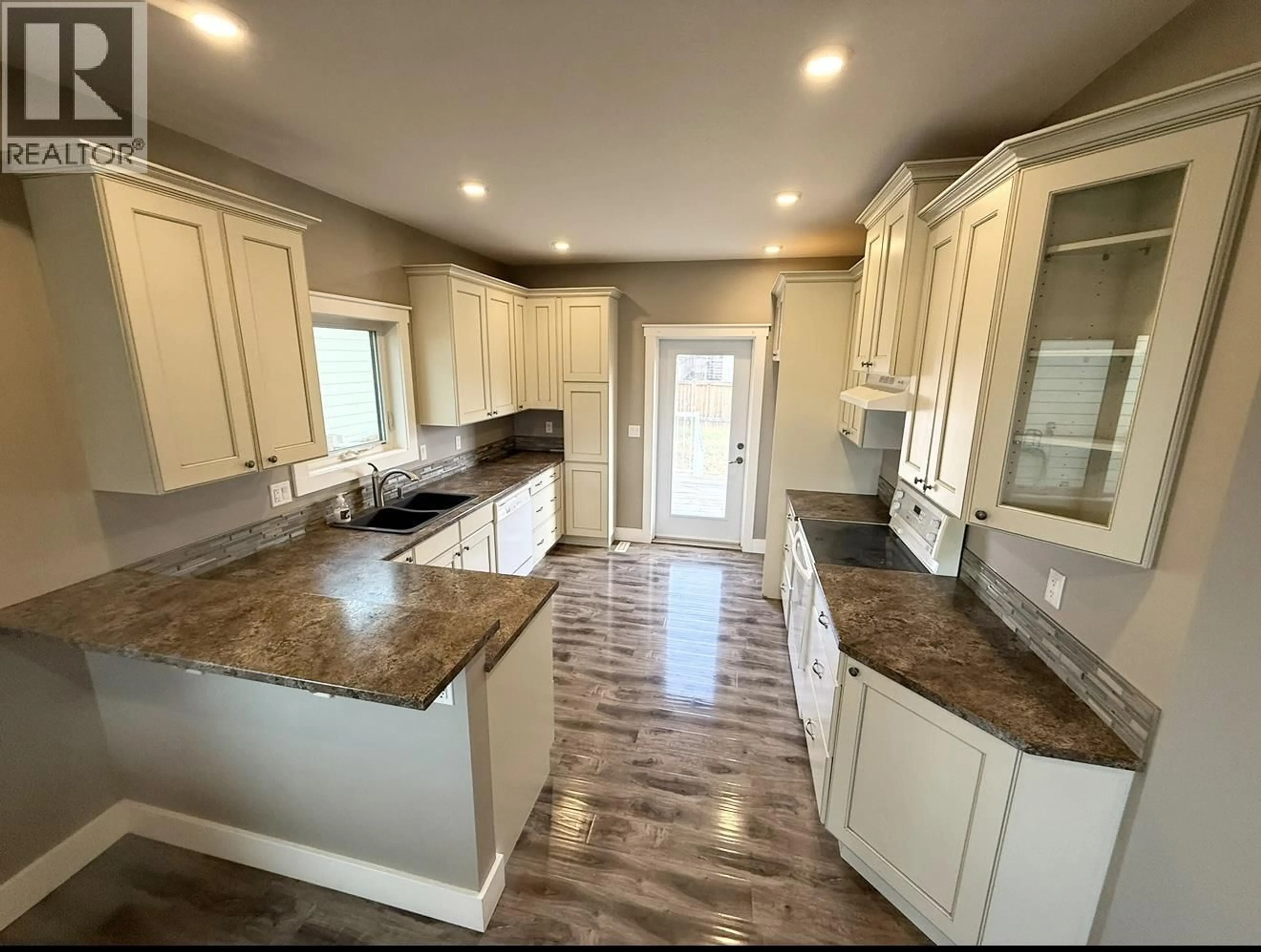 Open concept kitchen, unknown for 10511 111 STREET, Fort St. John British Columbia V1J0L6