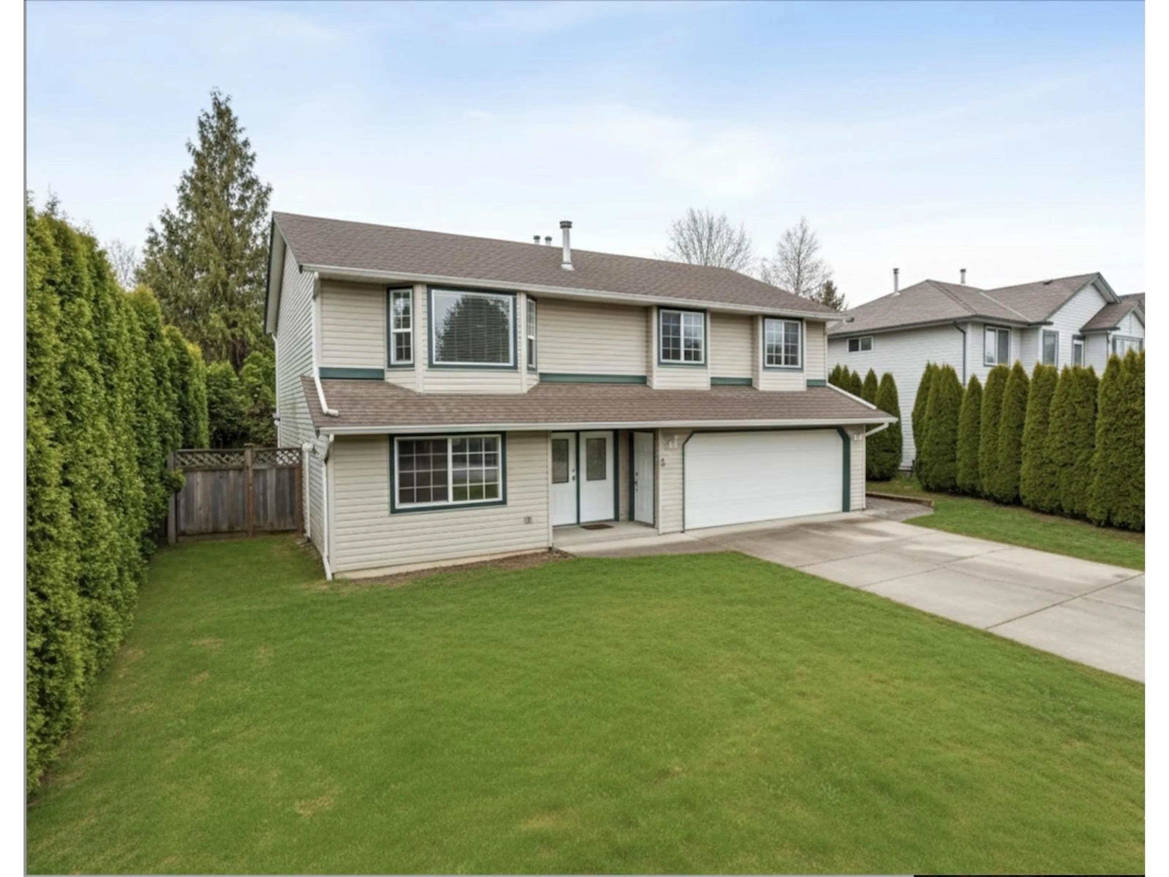Home with vinyl exterior material, street for 8251 WHARTON, Mission British Columbia V2V7A4