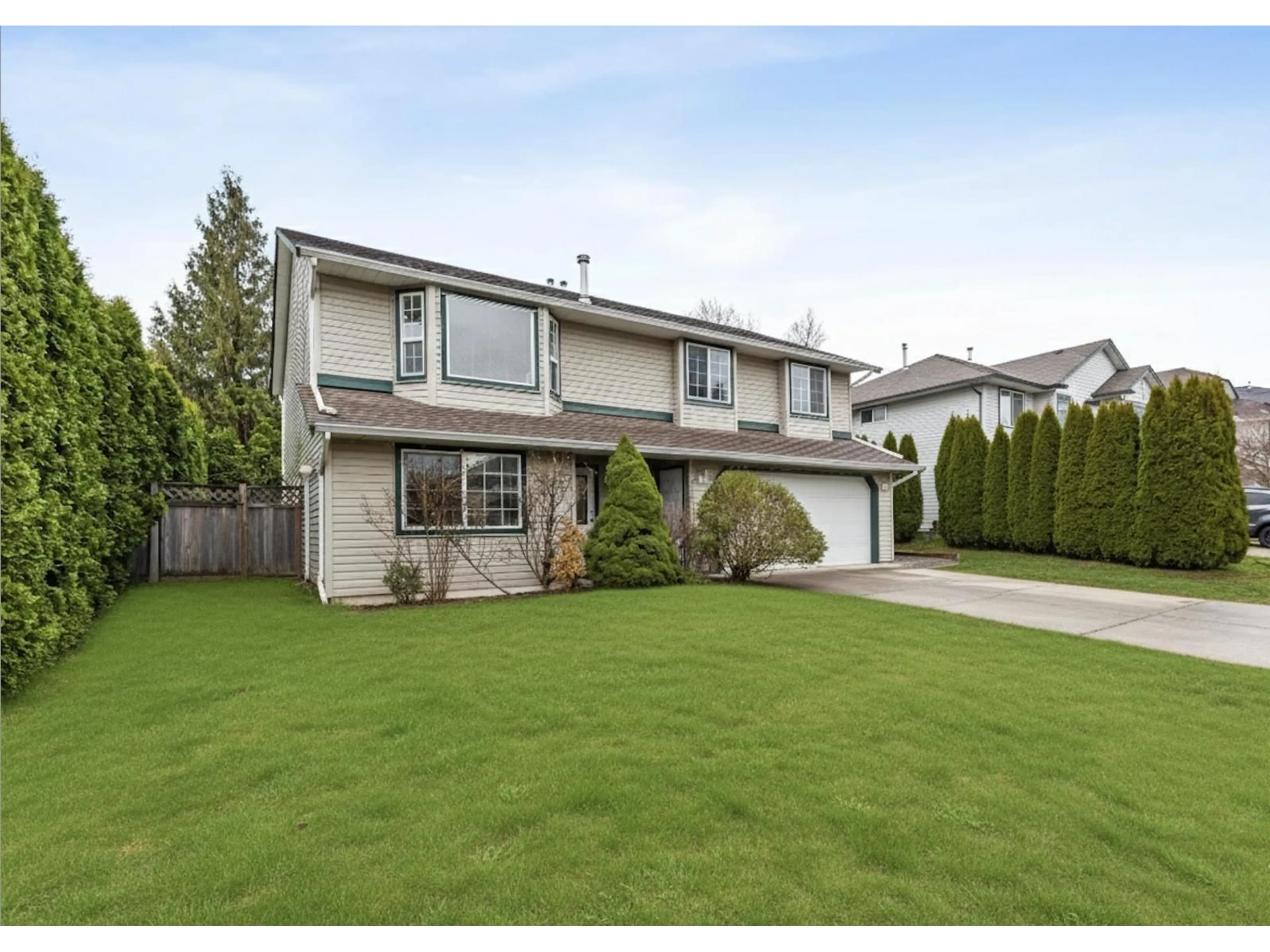 Home with vinyl exterior material, street for 8251 WHARTON, Mission British Columbia V2V7A4