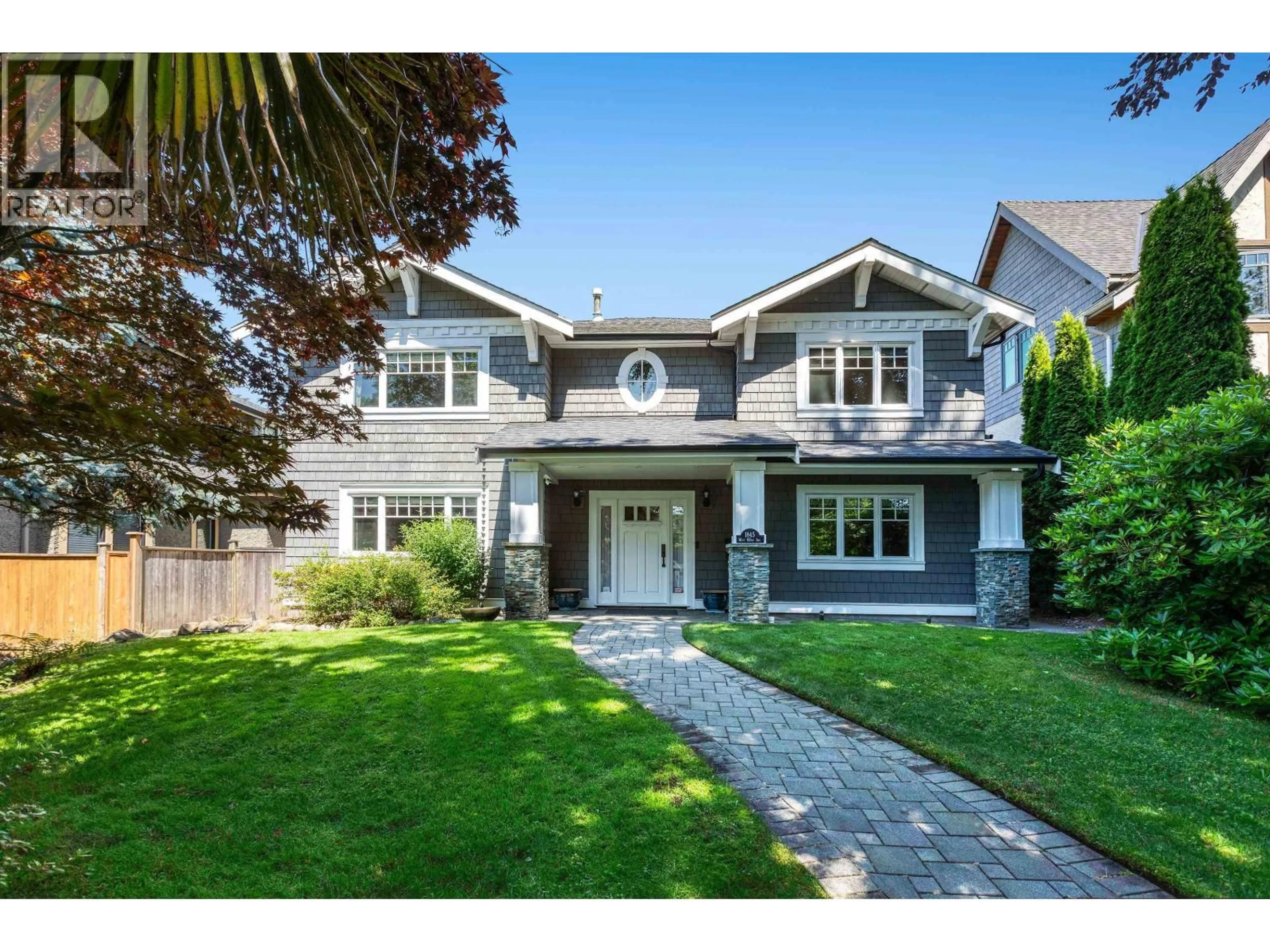 Home with vinyl exterior material, street for 1845 62ND AVENUE, Vancouver British Columbia V6P2G3