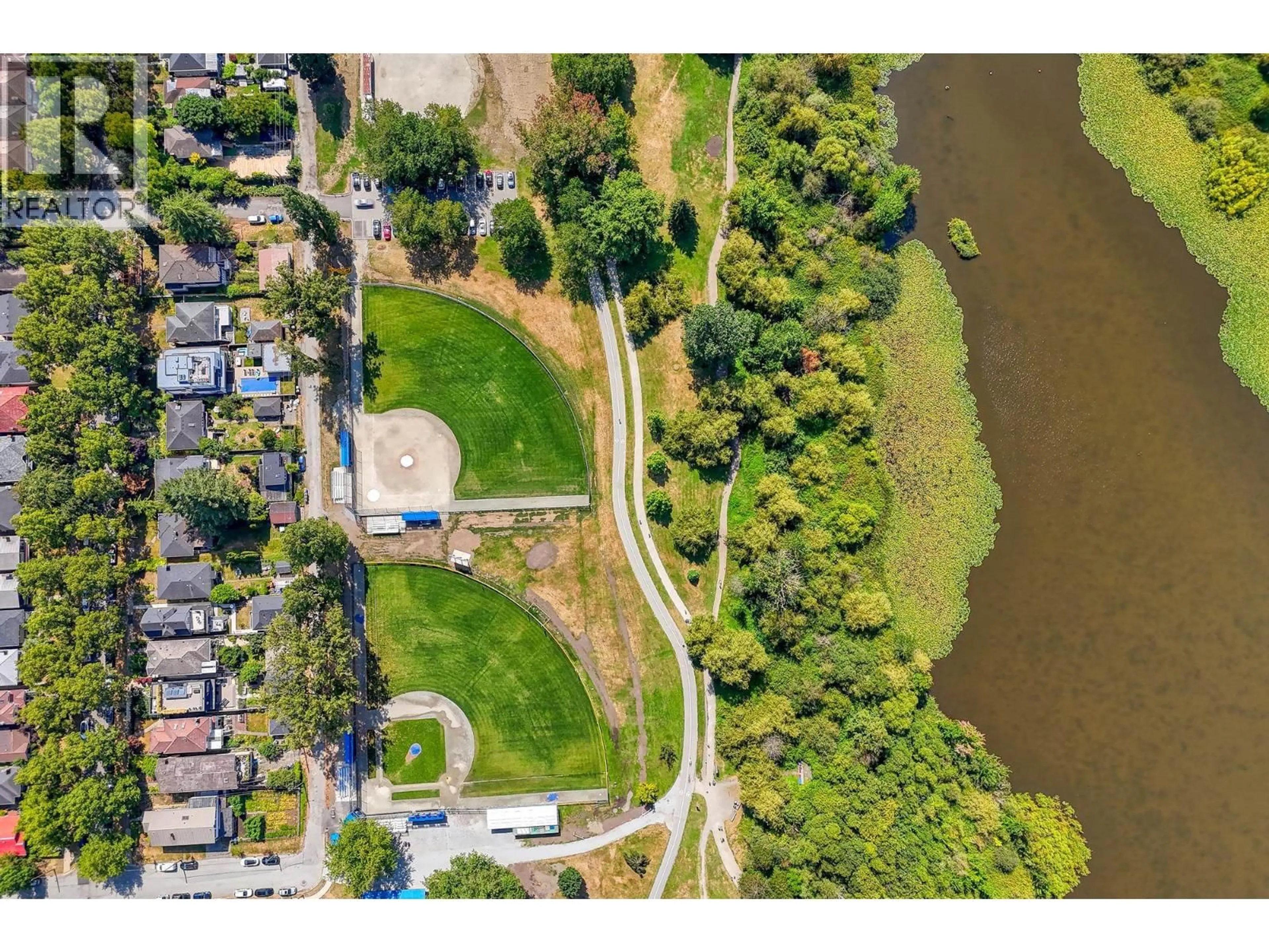 A pic from outside/outdoor area/front of a property/back of a property/a pic from drone, water/lake/river/ocean view for 3195 GARDEN DRIVE, Vancouver British Columbia V5N4Y2