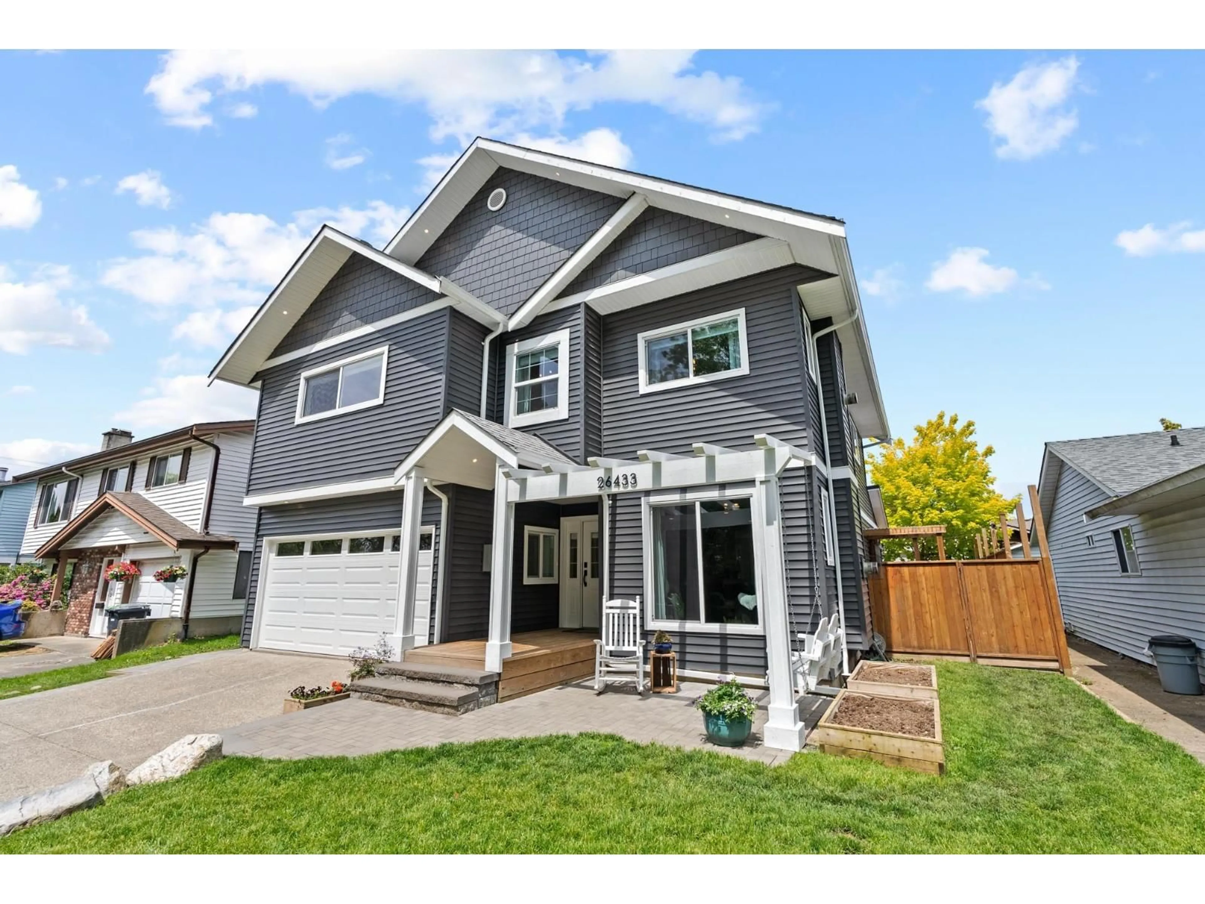Home with vinyl exterior material, street for 26433 28, Langley British Columbia V4W3A6